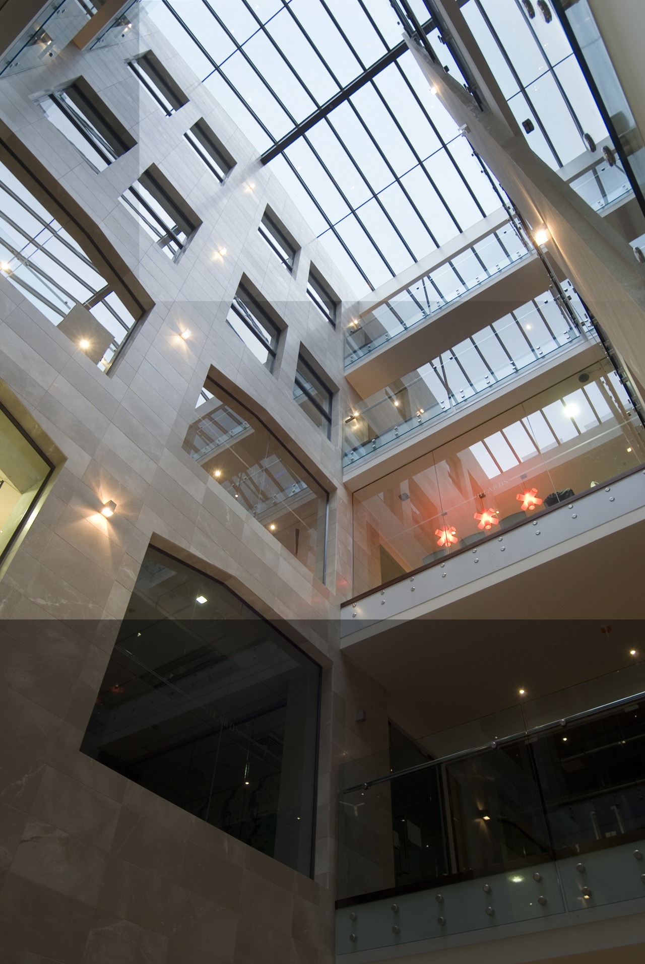 The solidity of the heards building ois expressed apartment, architecture, building, ceiling, corporate headquarters, daylighting, glass, headquarters, interior design, lobby, structure, window, black