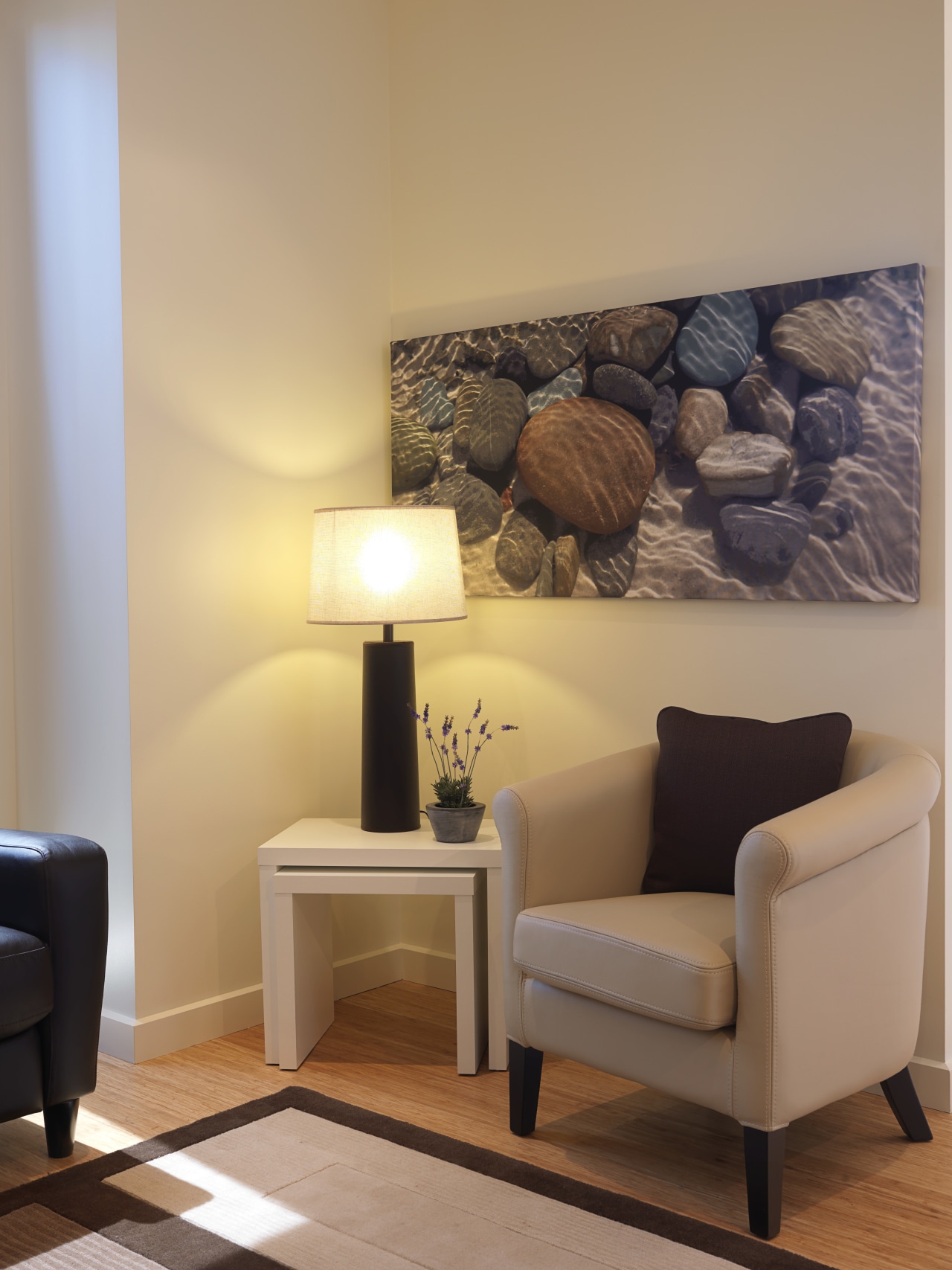 Every square metre of the apartments is designed floor, flooring, furniture, home, interior design, living room, room, table, wall, orange