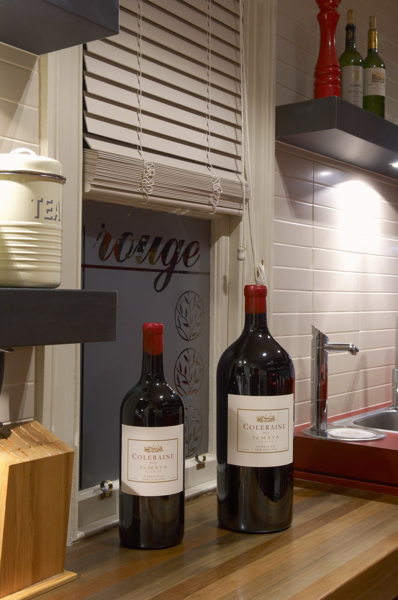 View of the hardwood countertops, shelving and sink bottle, distilled beverage, drink, flooring, furniture, glass, glass bottle, interior design, liqueur, table, wine, wood, brown, gray