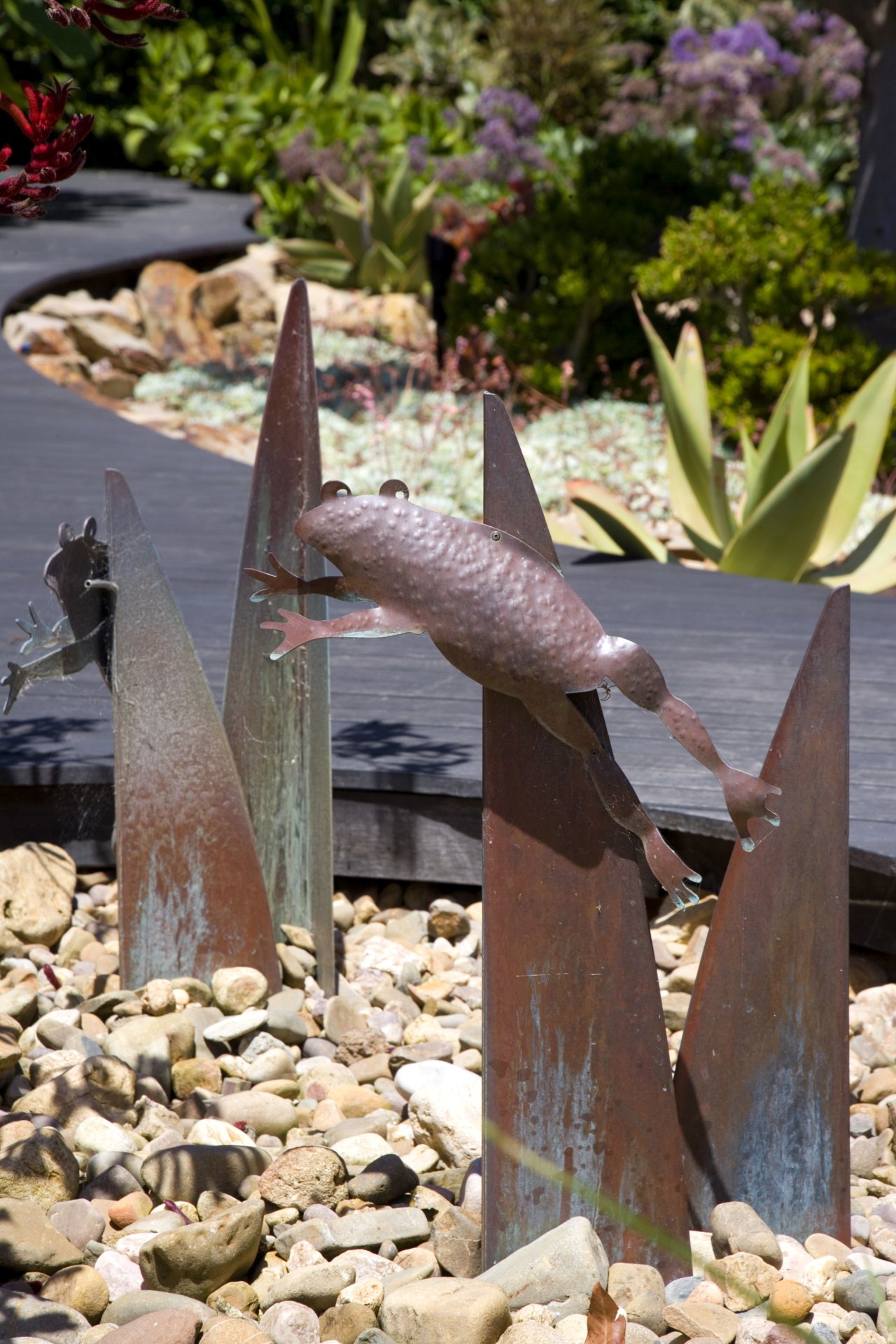 A close up view of the water feature. flora, flower, plant, wood, brown