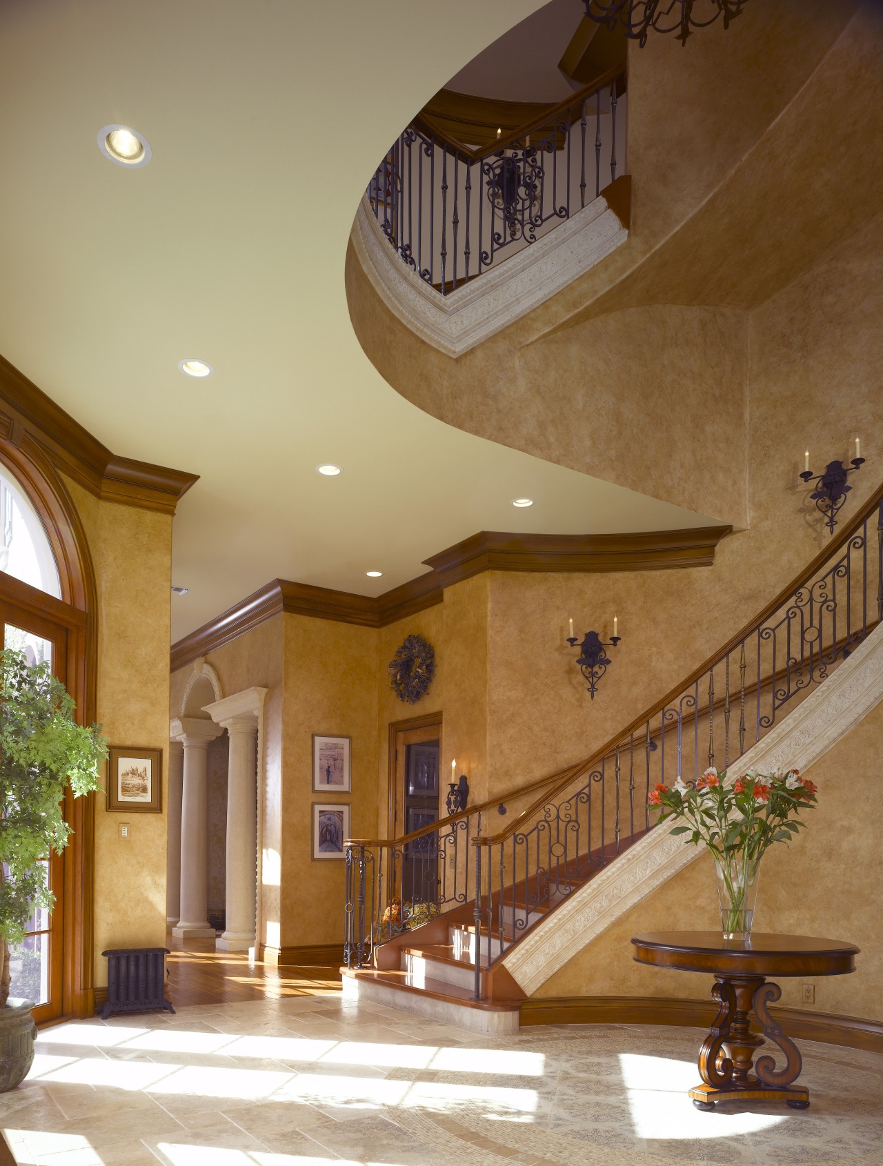 View of the staircase, stone floor, textured walls, architecture, baluster, ceiling, daylighting, estate, handrail, home, interior design, lobby, property, real estate, stairs, wall, wood, brown, orange