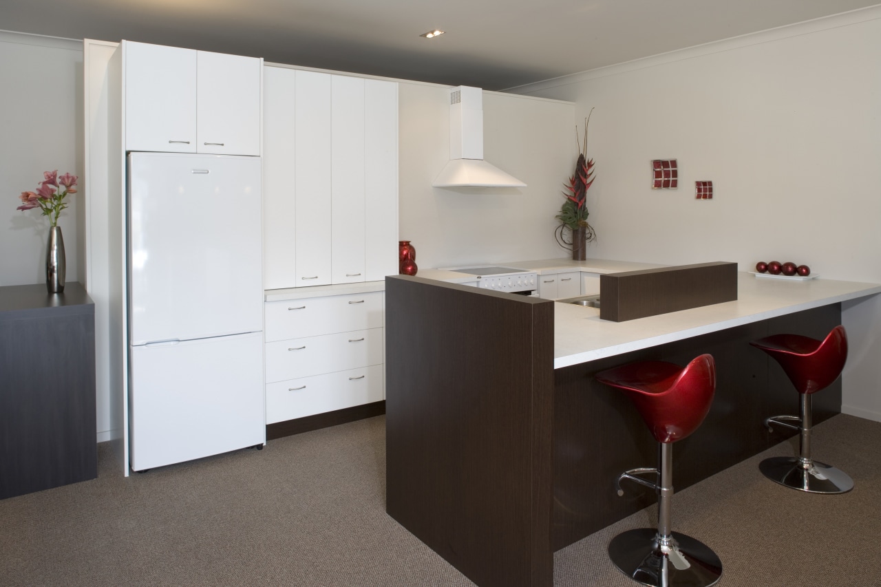 View of kitchens built with Laminex cabinetry and cabinetry, countertop, interior design, kitchen, office, product design, real estate, room, gray, black