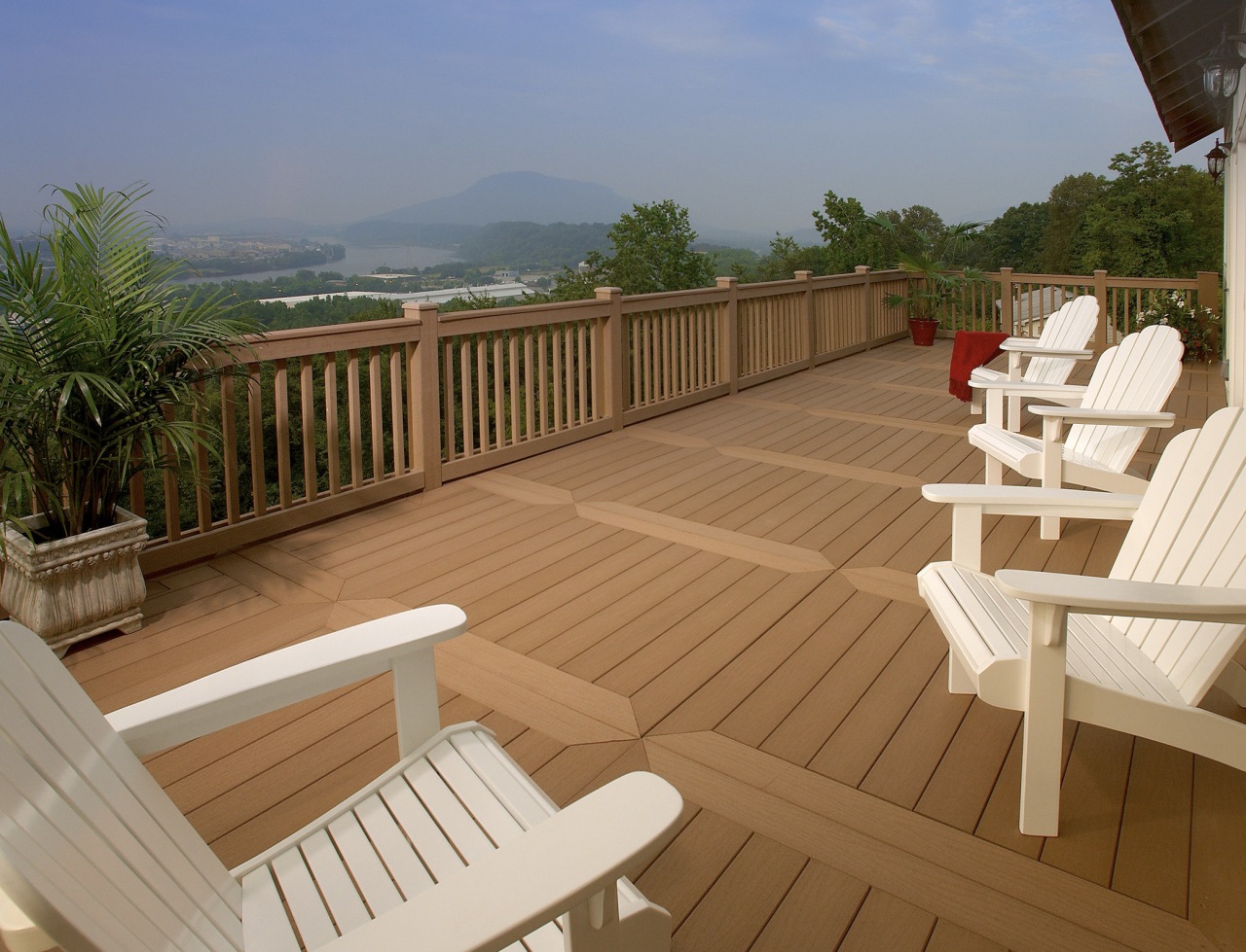 View of deck by WeatherBest Decking &amp; Railing. deck, floor, hardwood, outdoor furniture, outdoor structure, property, real estate, sunlounger, wood, wood stain, brown