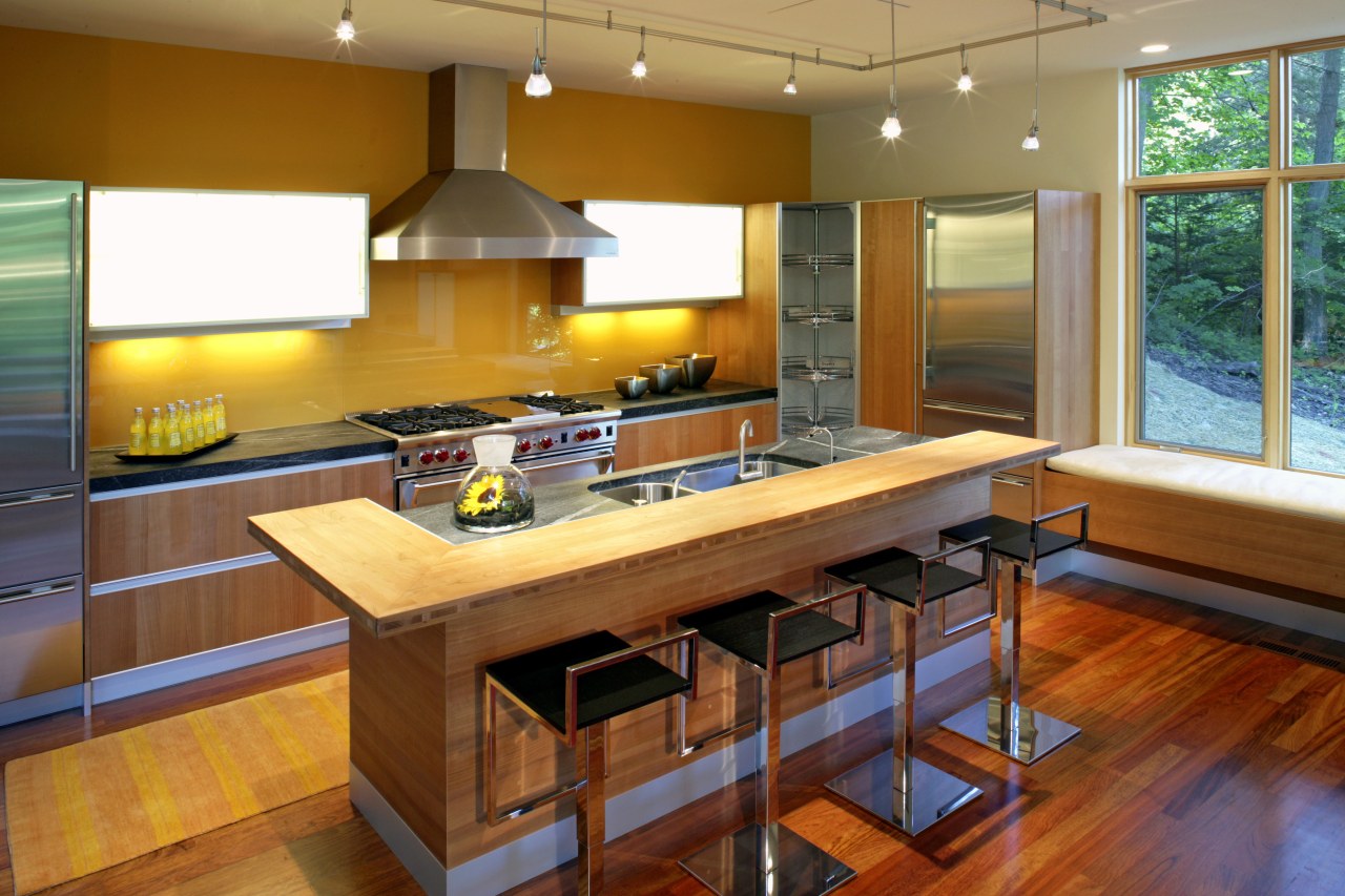 A view of a kitchen design by Valcucine cabinetry, countertop, hardwood, interior design, kitchen, real estate, room, wood, brown