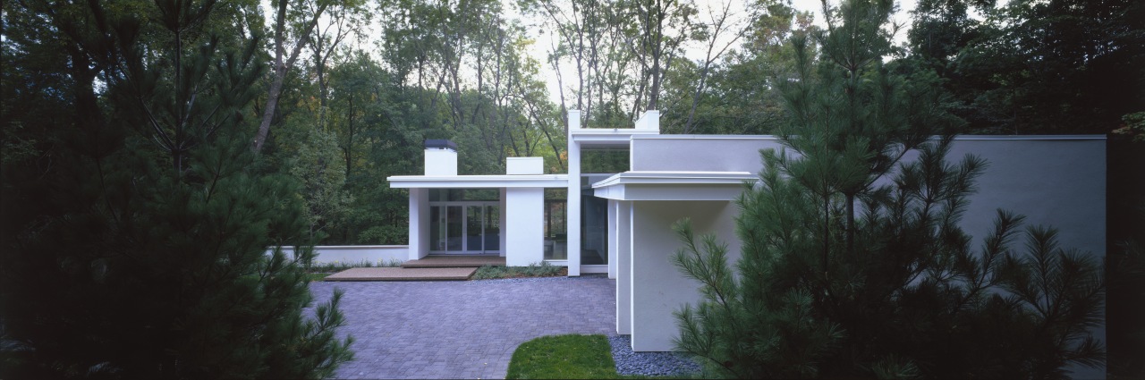 View of a house designed by Charles R architecture, backyard, cottage, estate, facade, grass, home, house, outdoor structure, plant, property, real estate, residential area, roof, tree, yard, black