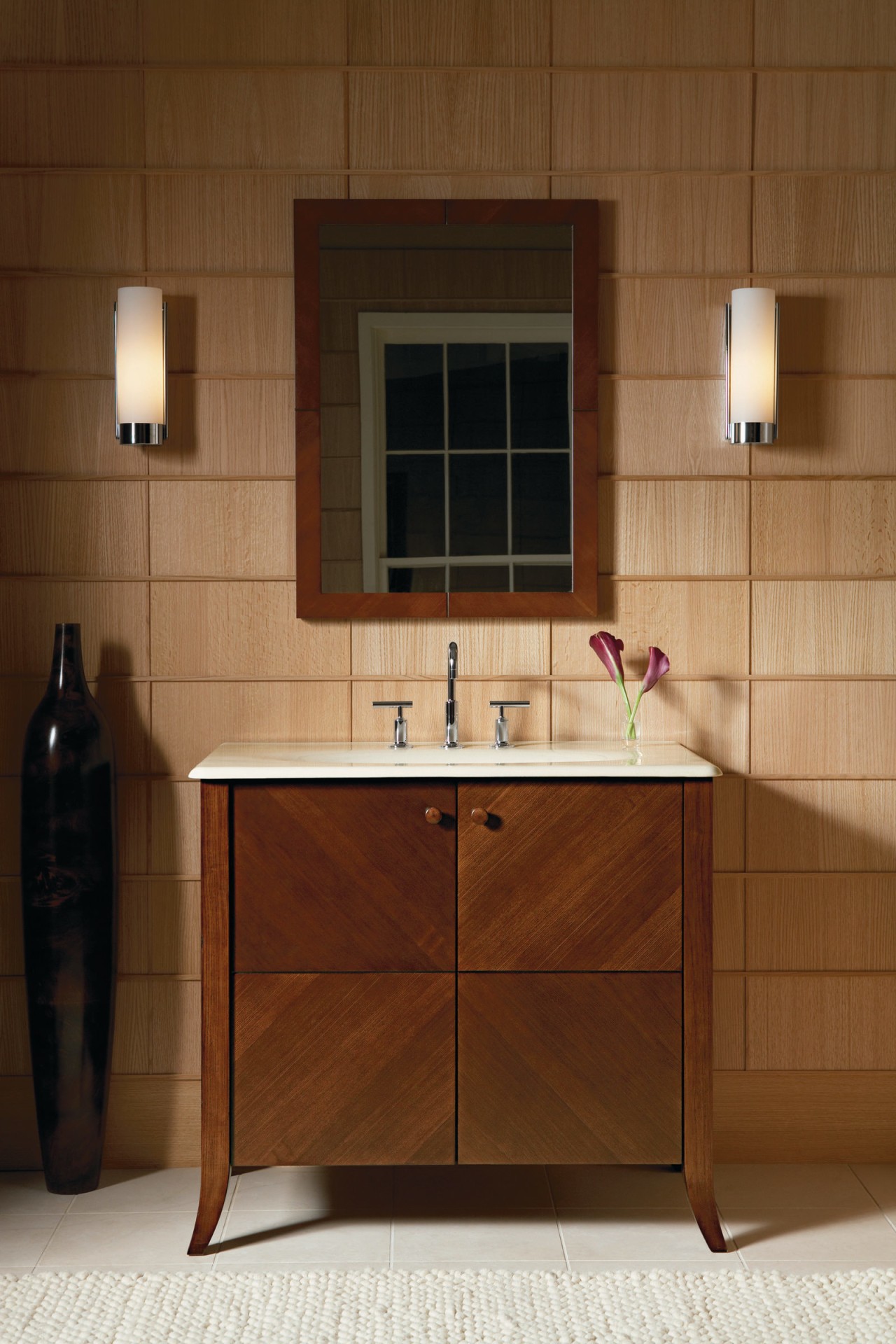 View of Kohler bathroomware. bathroom, bathroom accessory, bathroom cabinet, cabinetry, countertop, floor, flooring, furniture, hardwood, interior design, product design, room, sink, tile, wood stain, brown