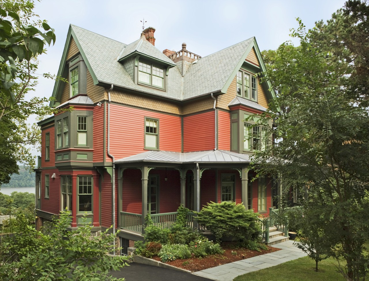 An exterior view of the entrance way to architecture, building, cottage, elevation, estate, facade, farmhouse, historic house, home, house, mansion, neighbourhood, outdoor structure, property, real estate, residential area, roof, siding, brown