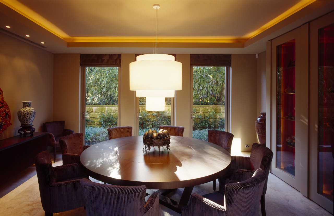 view of dining area featuring chandelier, lighting, travertine ceiling, dining room, estate, home, interior design, lighting, living room, property, real estate, room, table, wall, window, brown, red