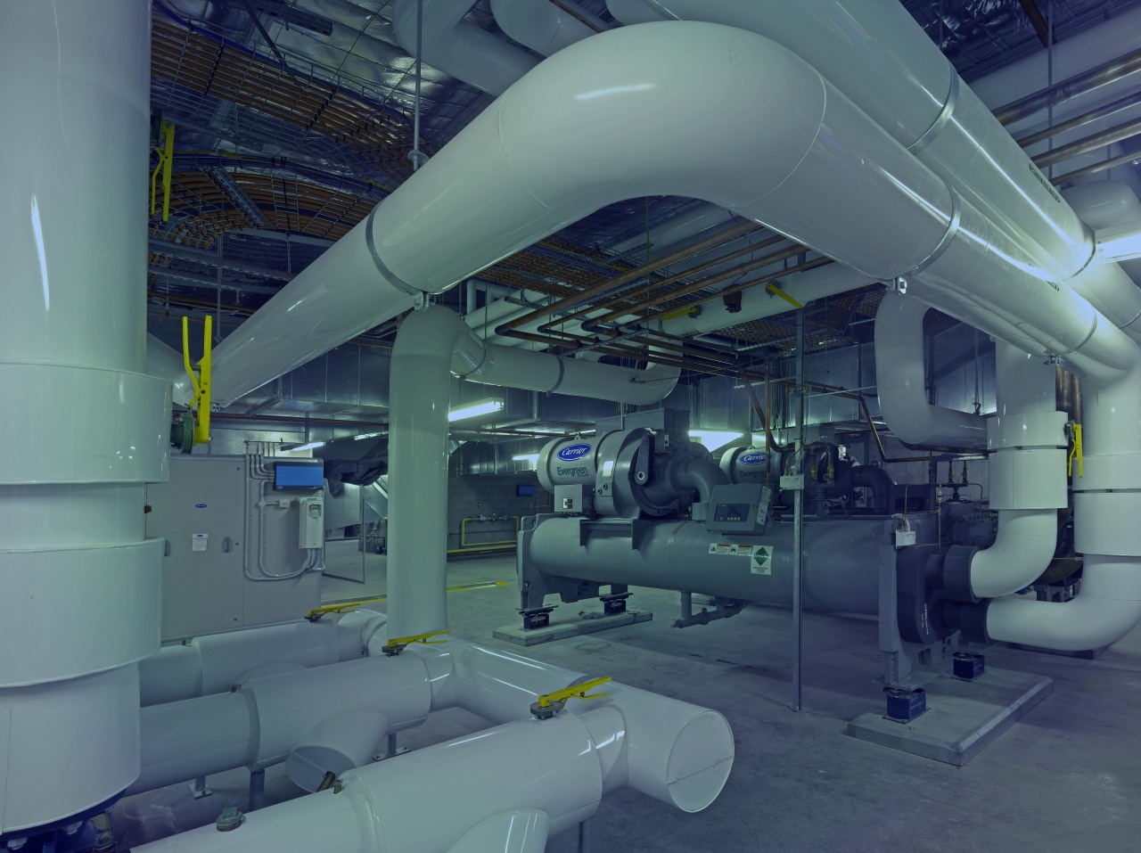 View of air conditioning unit from George Floth aerospace engineering, factory, industry, machine, technology, teal