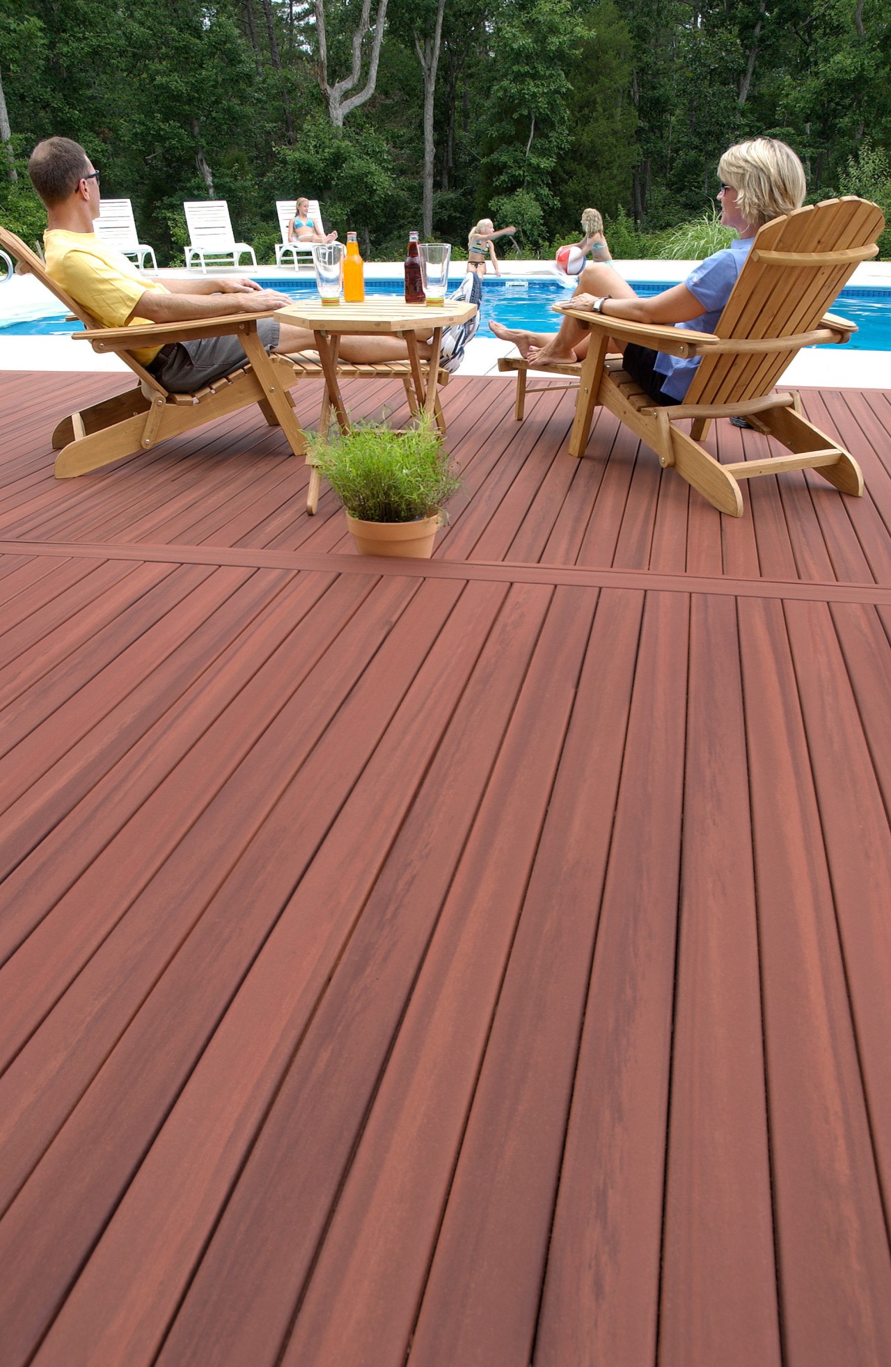 View of products from WeatherBest Decking &amp; Railing. deck, floor, flooring, garapa, hardwood, laminate flooring, outdoor furniture, outdoor structure, sunlounger, table, wood, wood flooring, wood stain, red