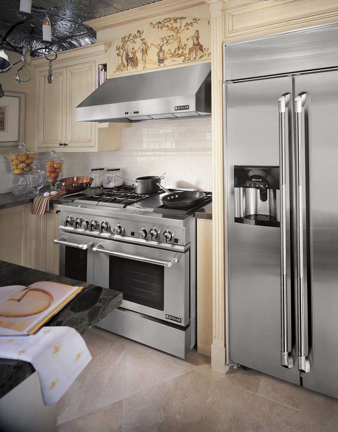 The Jenn-Air Pro-Style Stainless suite of appliances  cabinetry, countertop, gas stove, home appliance, interior design, kitchen, kitchen appliance, kitchen stove, major appliance, refrigerator, room, gray