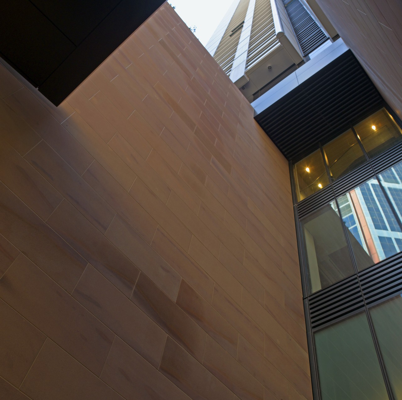 View of sandstone walls by Bondi Stone. angle, architecture, building, ceiling, daylighting, facade, floor, hardwood, house, light, lighting, line, roof, sky, wall, wood, brown