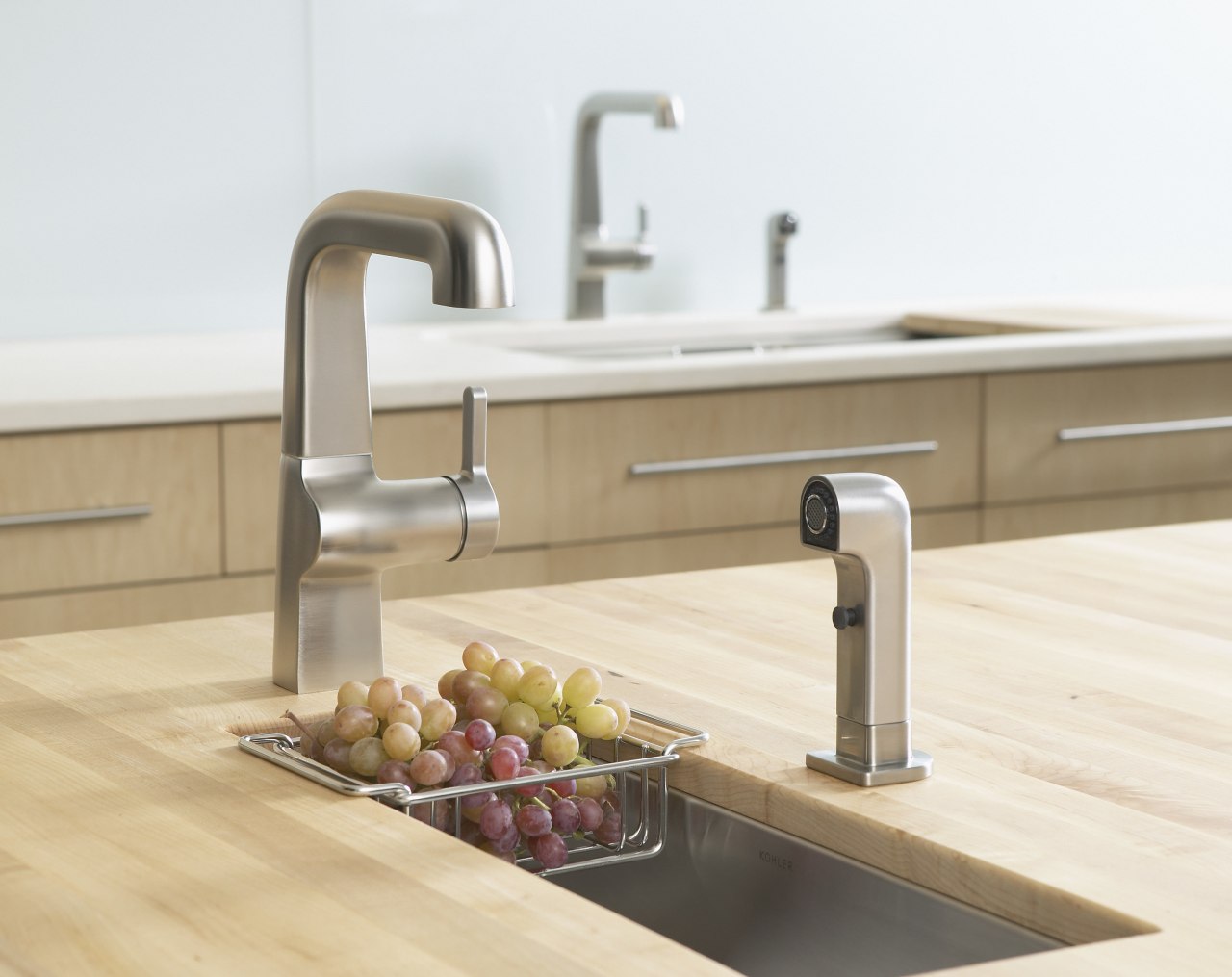 The Kohler Evoke faucet can be paired with countertop, kitchen, plumbing fixture, product design, sink, tap, white