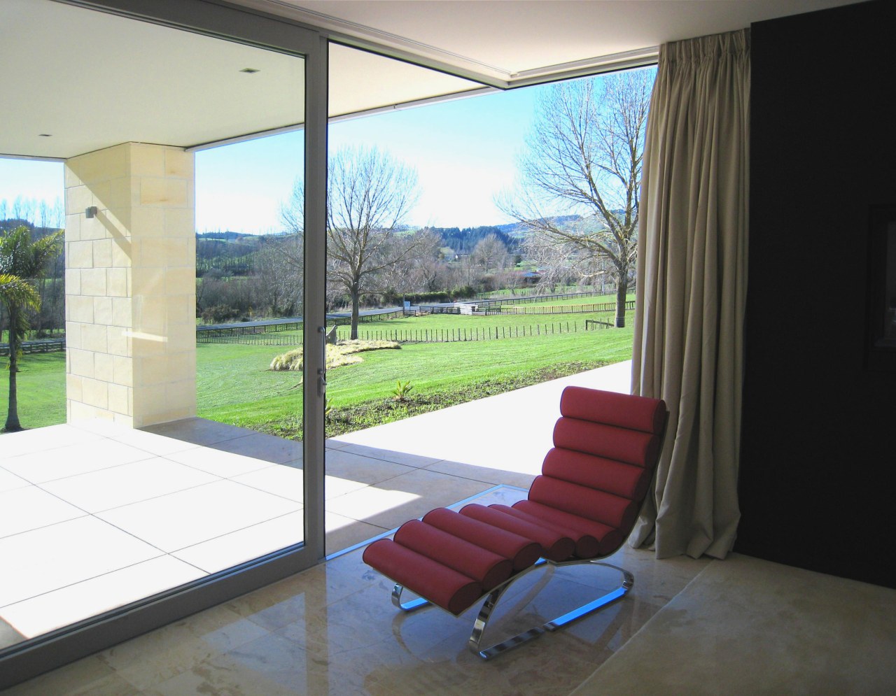 Sliding doors and marble flooring inside large house architecture, daylighting, door, home, house, interior design, property, real estate, window, white, black