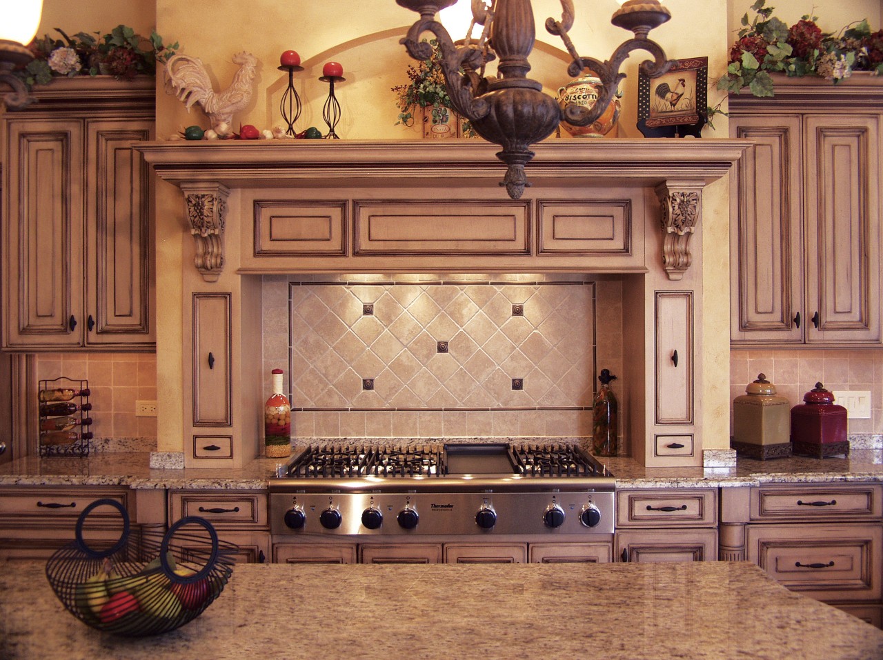 view of kitchen featuring cabinetry, wooden floors, lighting, cabinetry, countertop, cuisine classique, flooring, furniture, interior design, kitchen, room, under cabinet lighting, red, orange