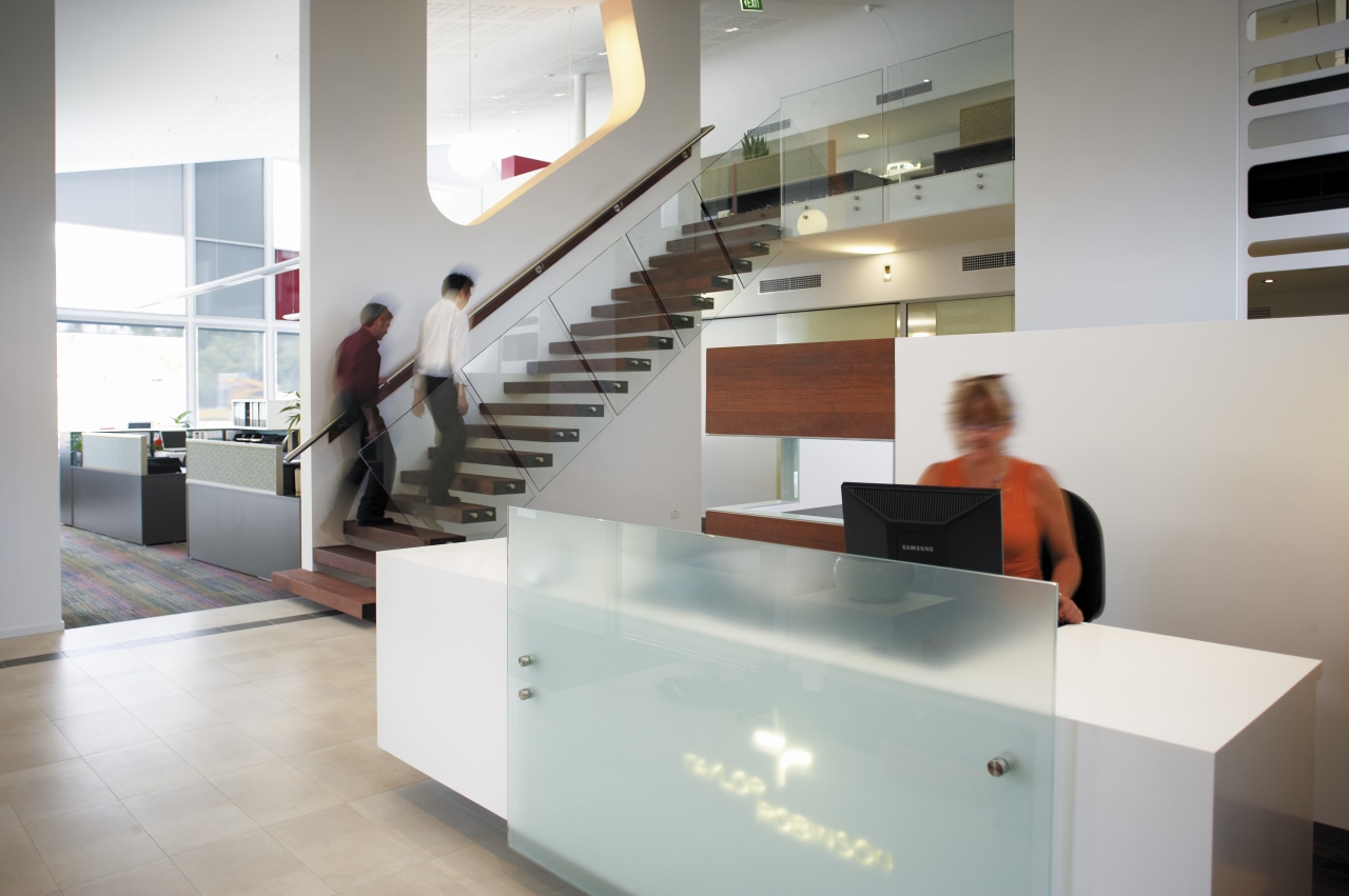 Interior image of the Taylor Robinson building featuring floor, flooring, furniture, interior design, product design, gray, white