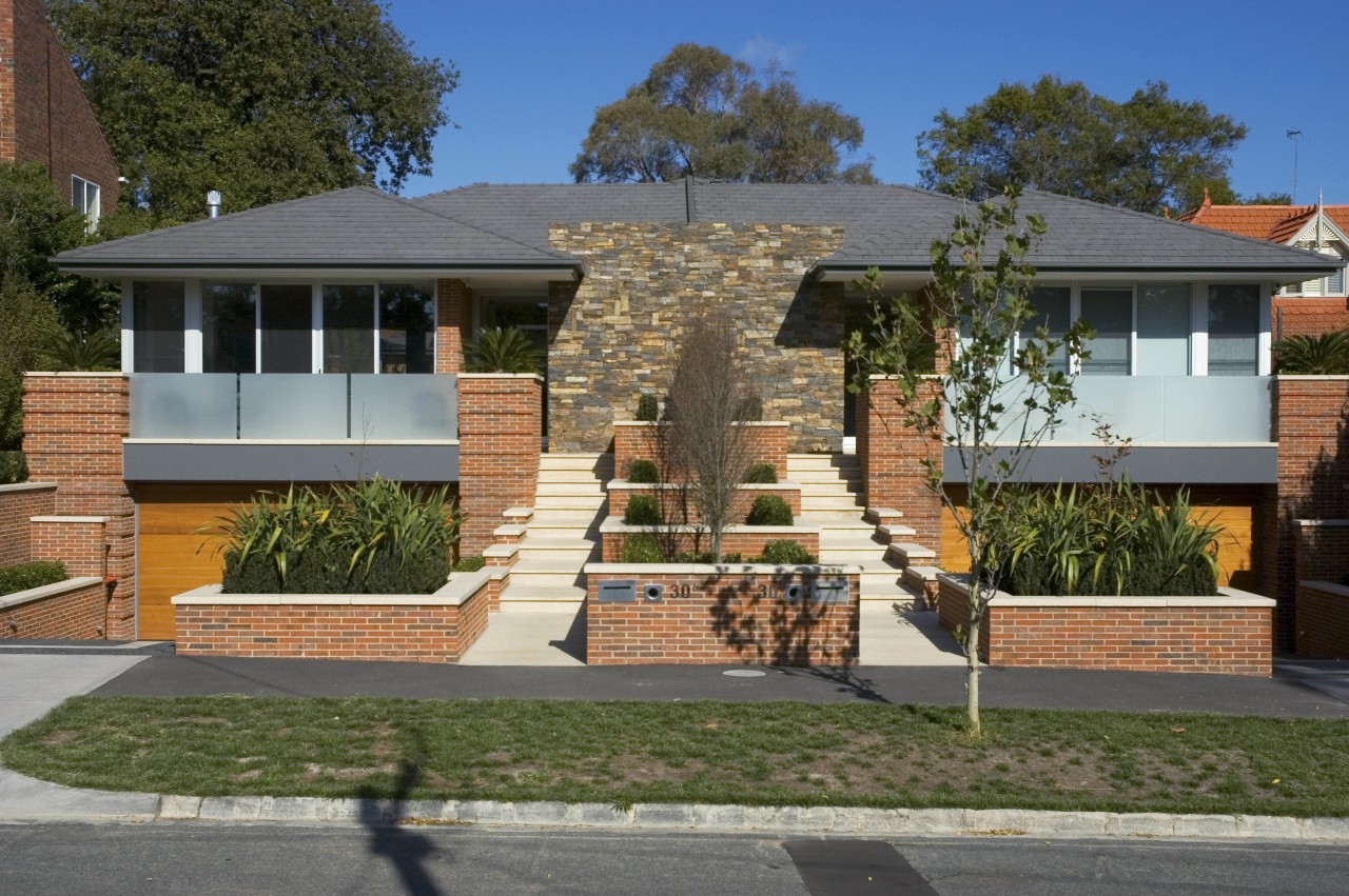 View of Stonehaven Home twin houses with basement architecture, cottage, elevation, estate, facade, home, house, landscaping, neighbourhood, outdoor structure, property, real estate, residential area, roof, siding, suburb, window, brown, gray