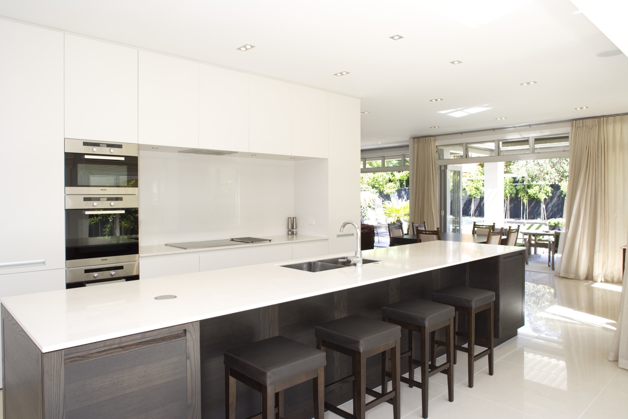 Sleek white kitchen with five metre island countertop, cuisine classique, interior design, kitchen, property, real estate, white