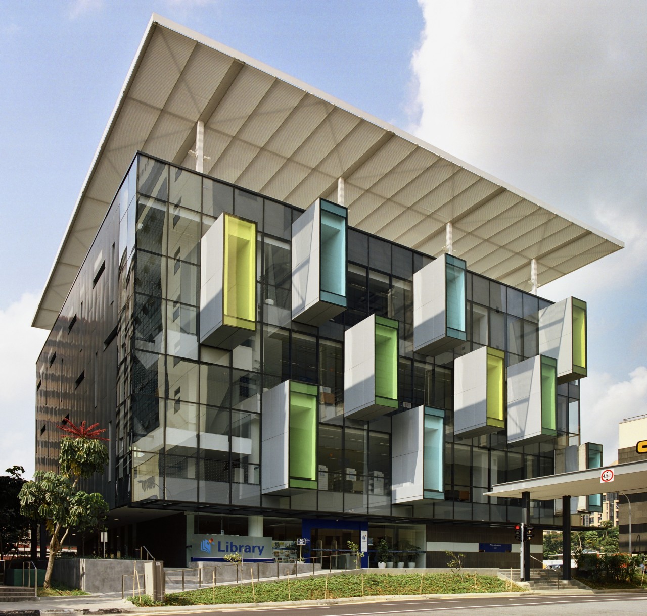 exterior view of the Bishan community Library featuring apartment, architecture, building, commercial building, condominium, corporate headquarters, elevation, facade, headquarters, mixed use, real estate, residential area, white