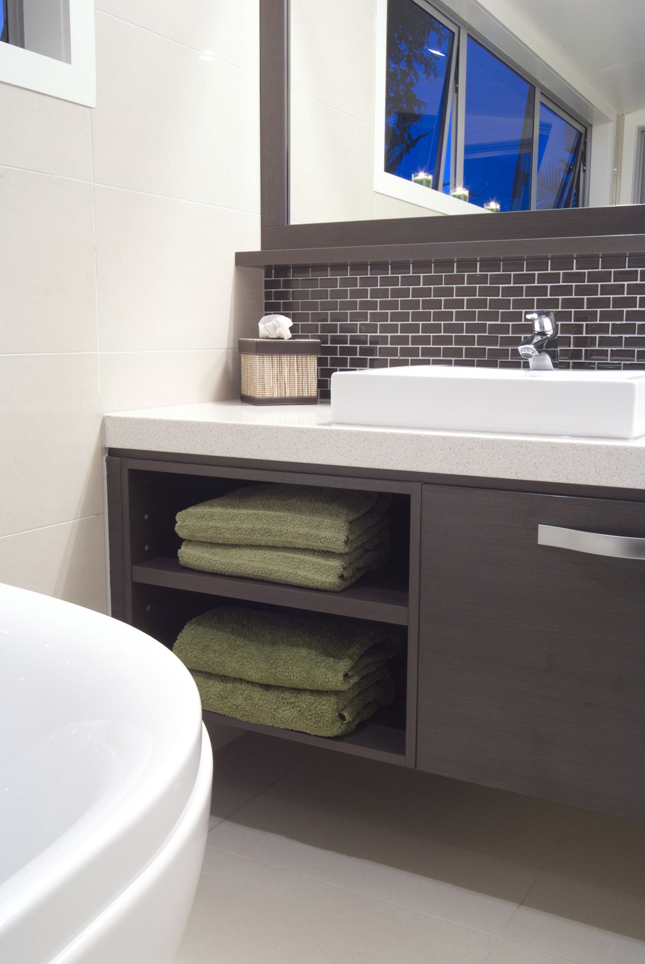 Image of a bathroom featuring CaesarStone and Linear bathroom, bathroom accessory, bathroom cabinet, countertop, floor, furniture, product, product design, room, sink, tile, white, black