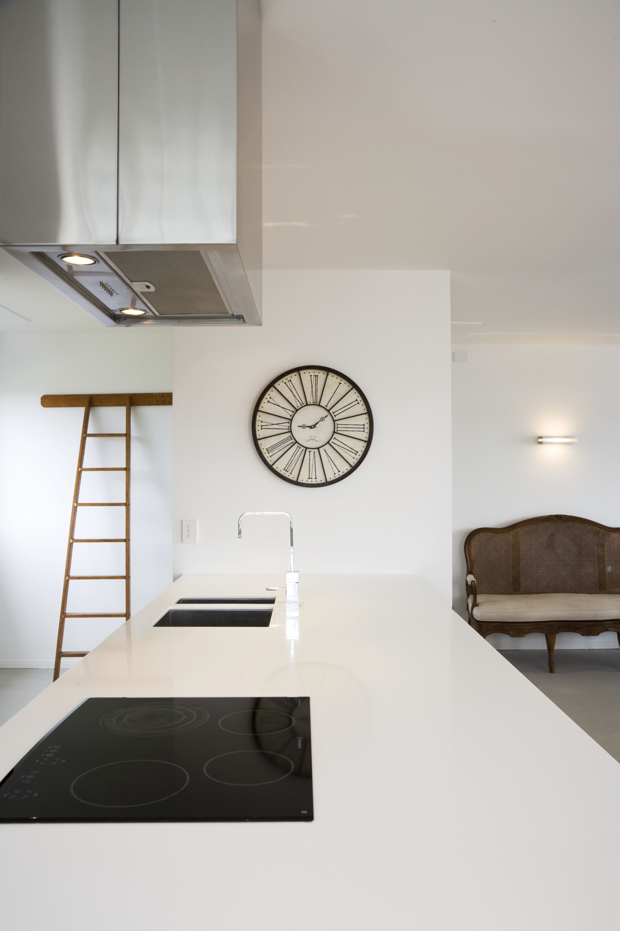 Image of renovated kitchen featuring lighting, kitchen appliances, architecture, ceiling, daylighting, floor, furniture, home, house, interior design, product design, room, table, wall, white