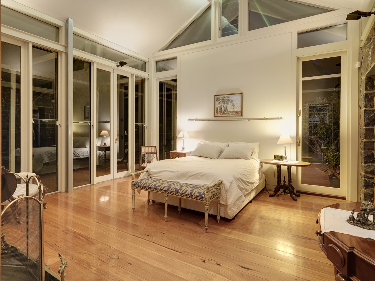 Bluestone, waxed timber and cream paintwork visually link bed frame, bedroom, ceiling, estate, floor, flooring, hardwood, interior design, laminate flooring, real estate, room, window, wood, wood flooring, orange, brown