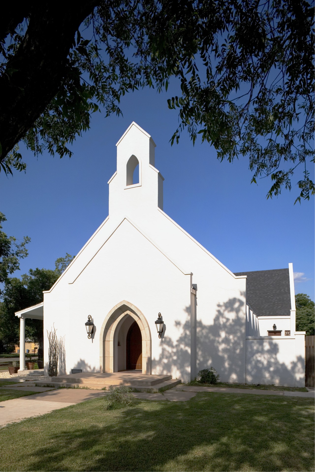 Exterior view of an original 1920s church building, architecture, building, chapel, church, estate, facade, home, house, mission, parish, place of worship, real estate, sky, spanish missions in california, steeple, tree, blue