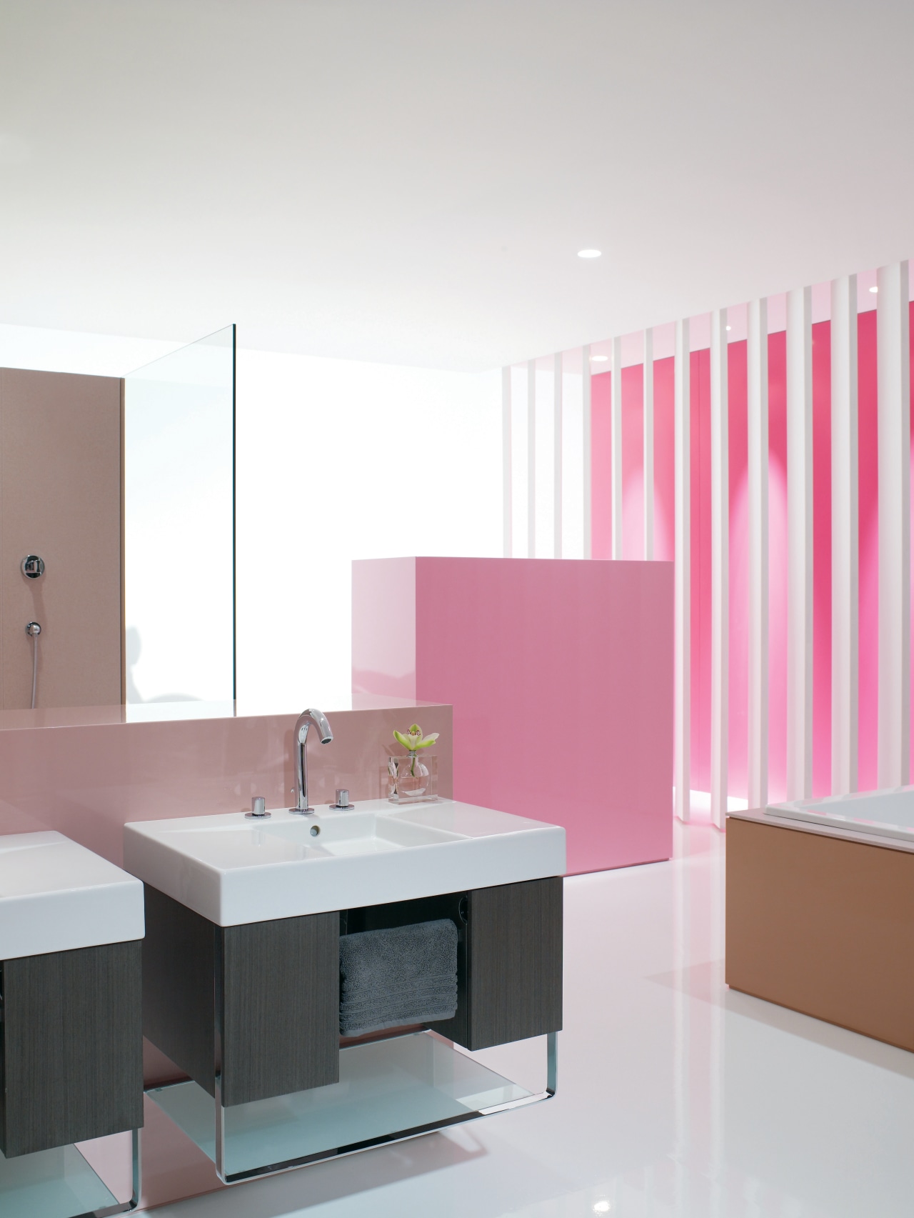 New Kohler bathroom fixtures include the Oblo faucet; bathroom, bathroom cabinet, floor, furniture, interior design, kitchen, pink, product, product design, purple, sink, table, white