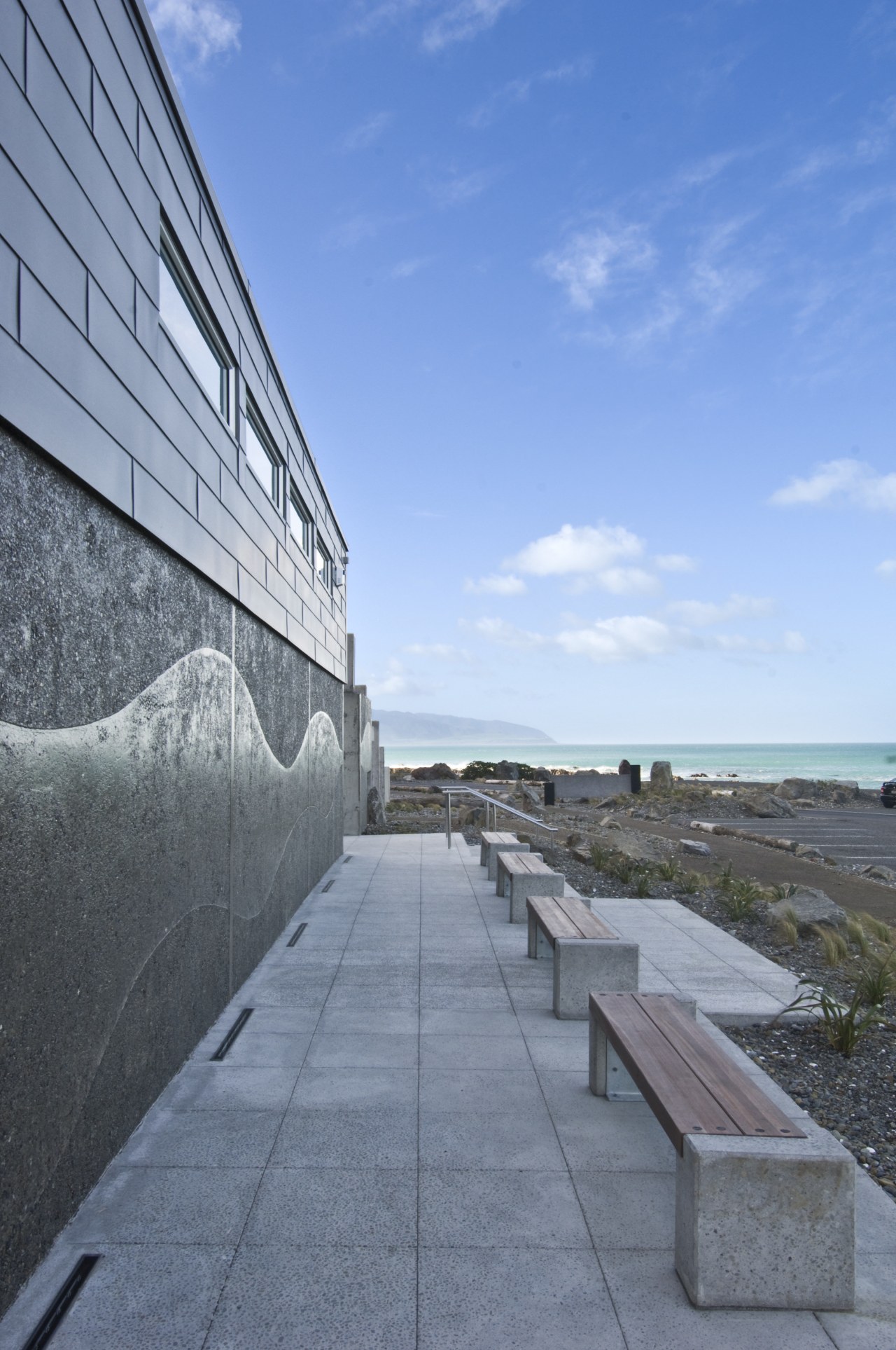 Mainzeal Construction built this new infomation centre at architecture, building, cloud, daytime, facade, house, roof, sky, walkway, wall, teal, gray