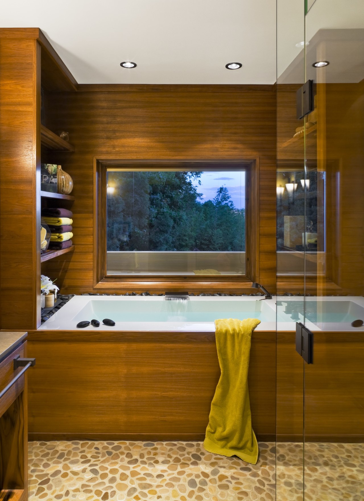 This Japanese-styled bathroom features a large bathtub with cabinetry, ceiling, countertop, interior design, kitchen, room, brown