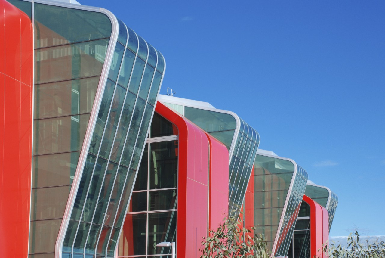 Image of curved glazing from on this fire architecture, blue, building, city, commercial building, corporate headquarters, daytime, facade, line, metropolis, metropolitan area, real estate, sky, skyscraper, structure, tower block, urban area, teal