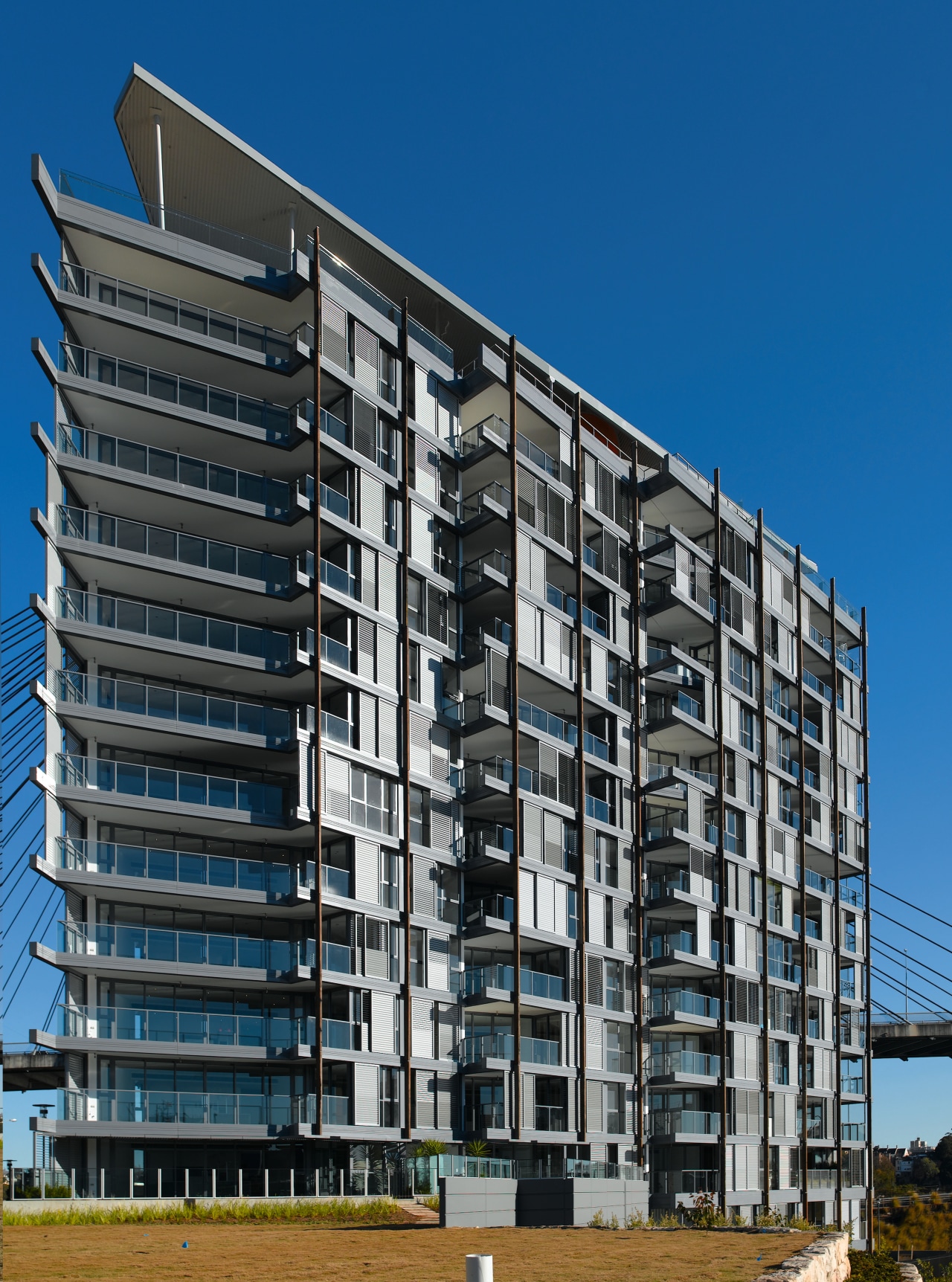 Evolve is a brand new 47-apartment development by apartment, architecture, building, commercial building, condominium, corporate headquarters, elevation, facade, home, house, metropolis, metropolitan area, mixed use, neighbourhood, property, real estate, residential area, sky, suburb, tower block, black, blue