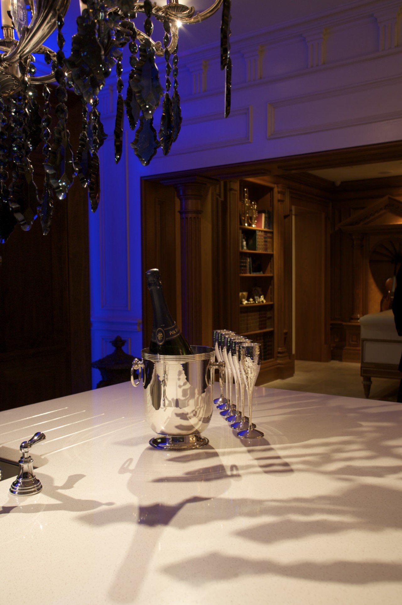 Image of the kitchen island with chandelier and flooring, function hall, house, interior design, light, lighting, restaurant, black, orange