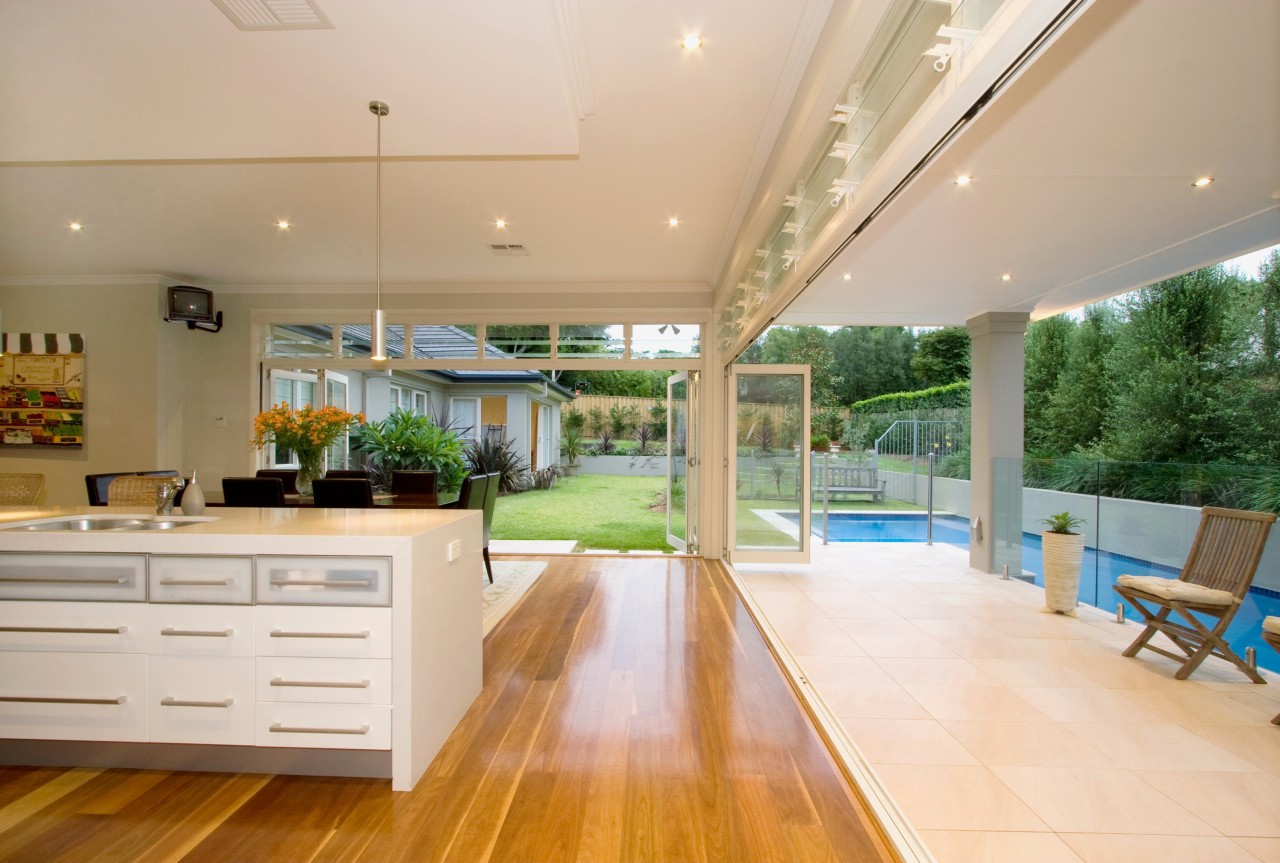 View of the kitchen and dining area in ceiling, estate, floor, flooring, hardwood, house, interior design, kitchen, real estate, orange, white