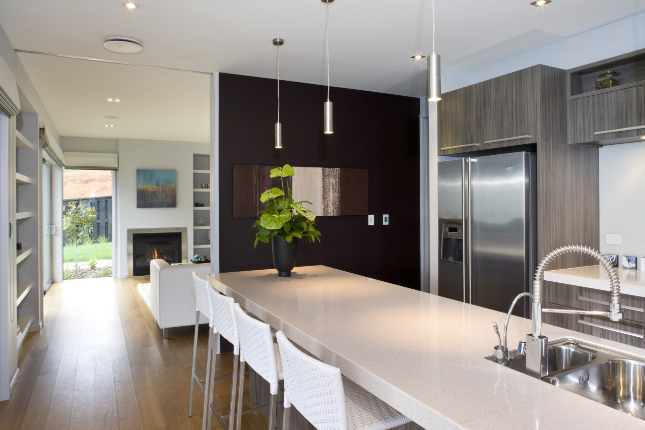 The warm tones of Resene Livid Brown from countertop, interior design, kitchen, real estate, room, gray