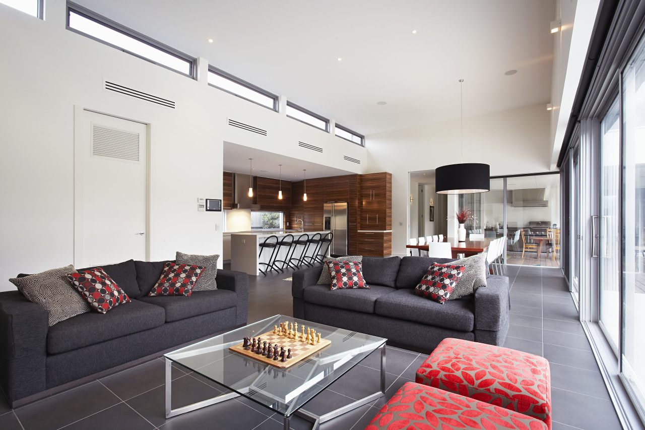 A sheltered outdoor room is located beyond the ceiling, interior design, living room, property, real estate, room, white