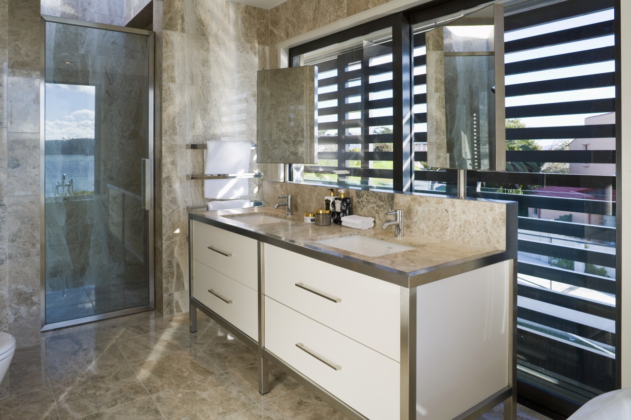 View of the master bathroom with floor-to-ceiling marble, bathroom, cabinetry, countertop, interior design, kitchen, room, gray