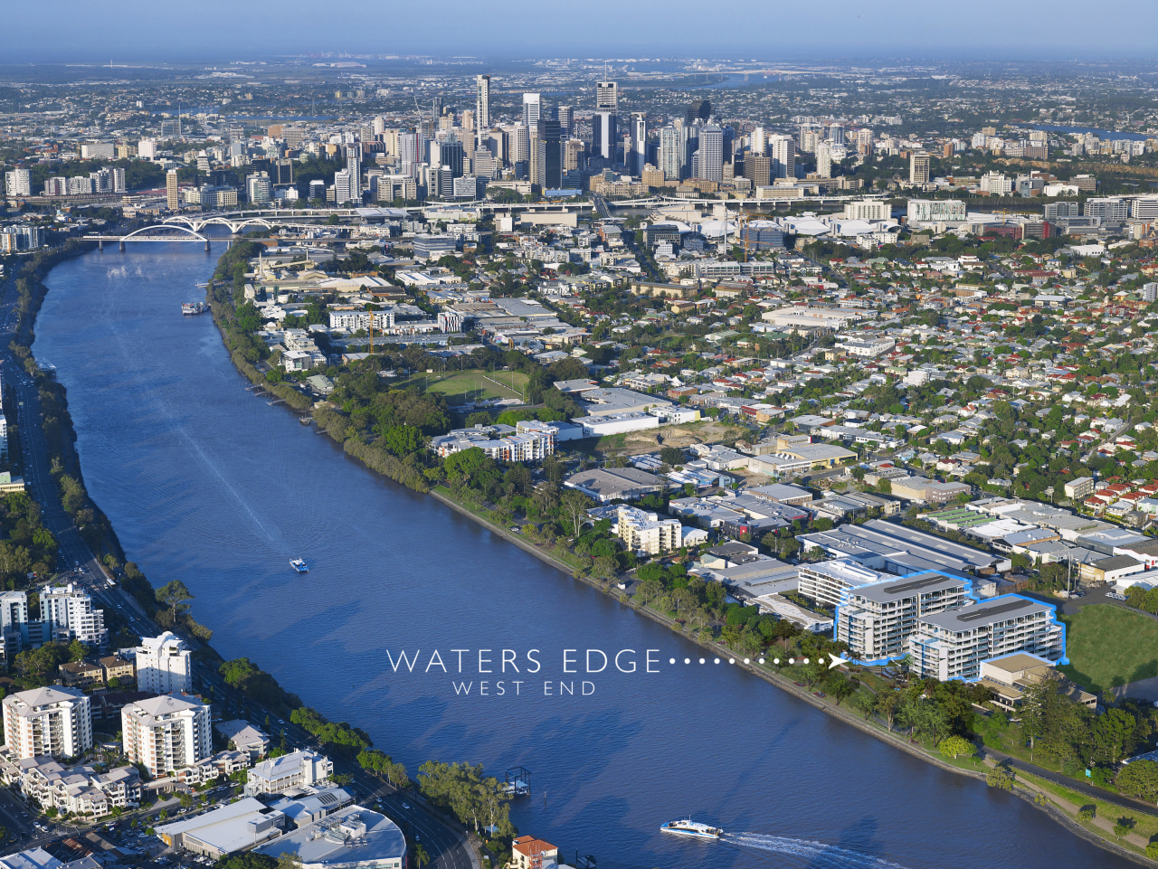 The Waters Edge Developments are set on the aerial photography, bird's eye view, city, cityscape, daytime, metropolis, metropolitan area, photography, river, sky, skyline, suburb, urban area, water, water resources, waterway, blue