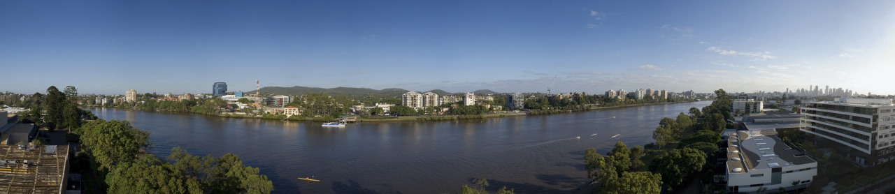The Waters Edge Developments are set on the bird's eye view, city, cityscape, daytime, horizon, lake, metropolis, metropolitan area, panorama, photography, real estate, reflection, river, sky, skyline, skyscraper, urban area, water, teal