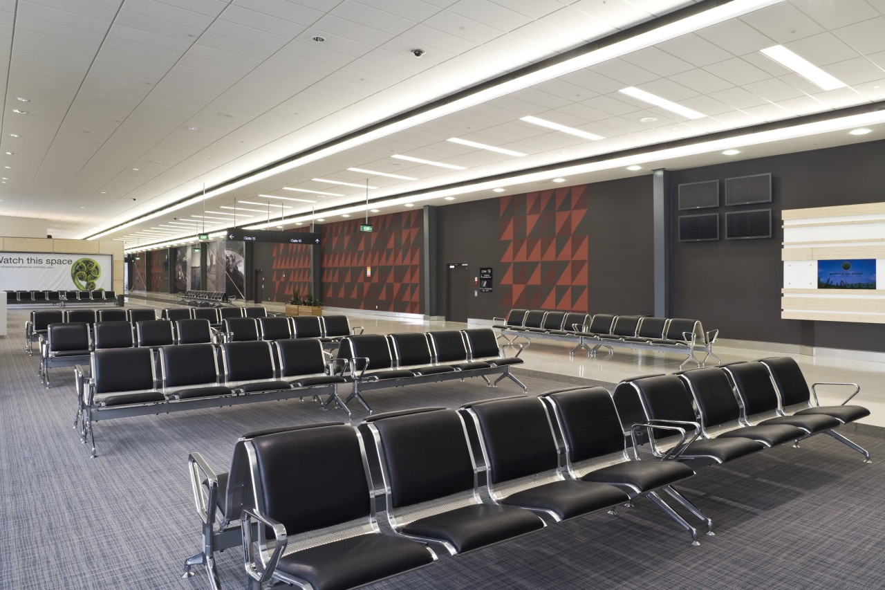 Images of new Pier at Auckland Airport designed auditorium, conference hall, infrastructure, black, gray, white