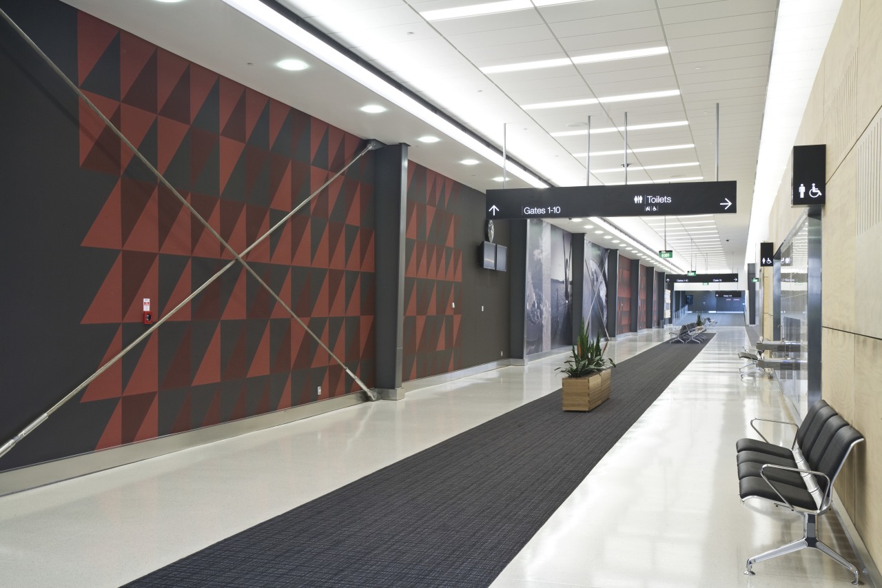 Images of the international terminal at Auckland Airport. architecture, ceiling, interior design, lobby, white, black