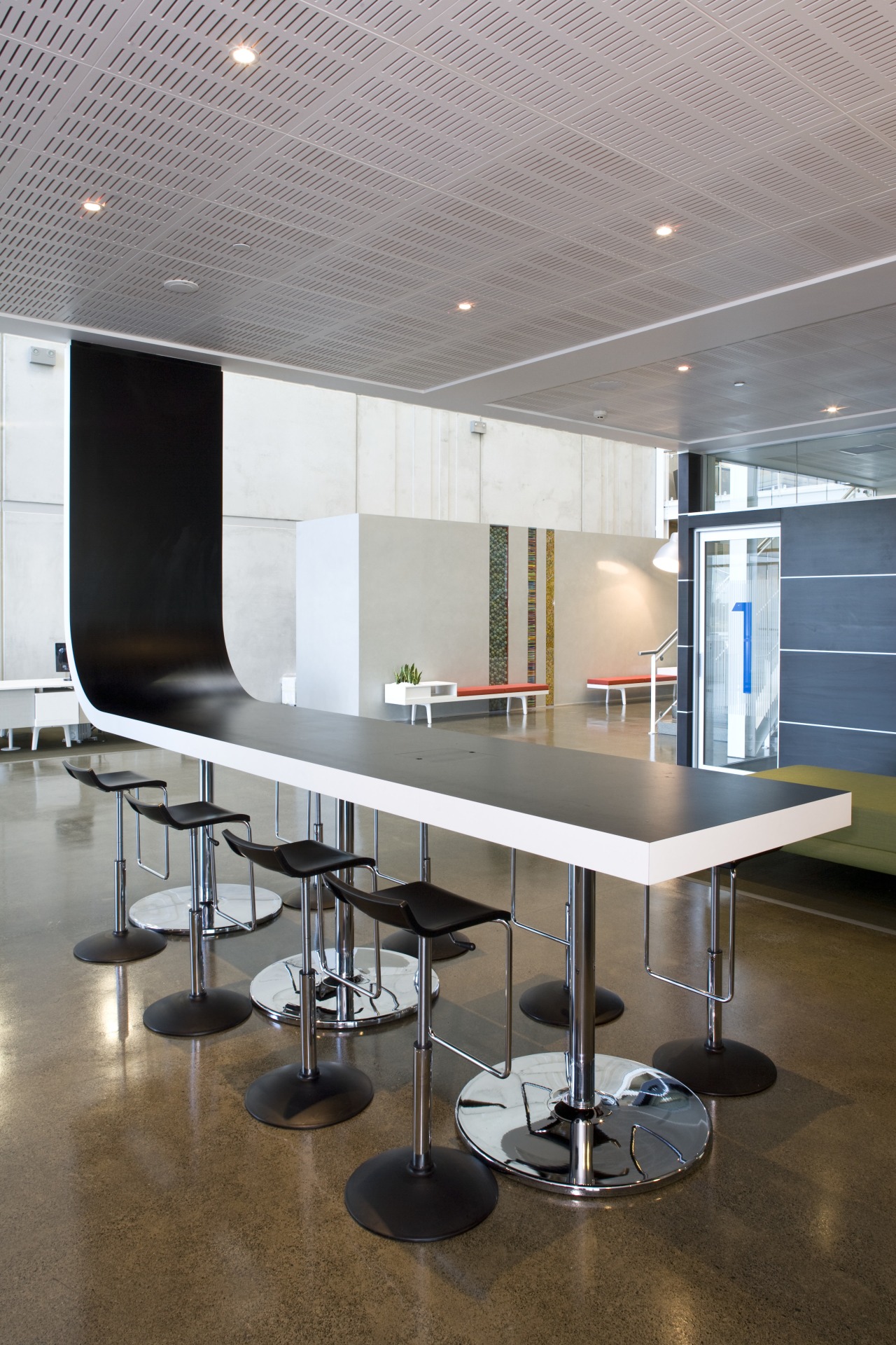 Interior of Office max offices featuring office furniture, architecture, ceiling, floor, furniture, glass, interior design, office, product design, table, gray