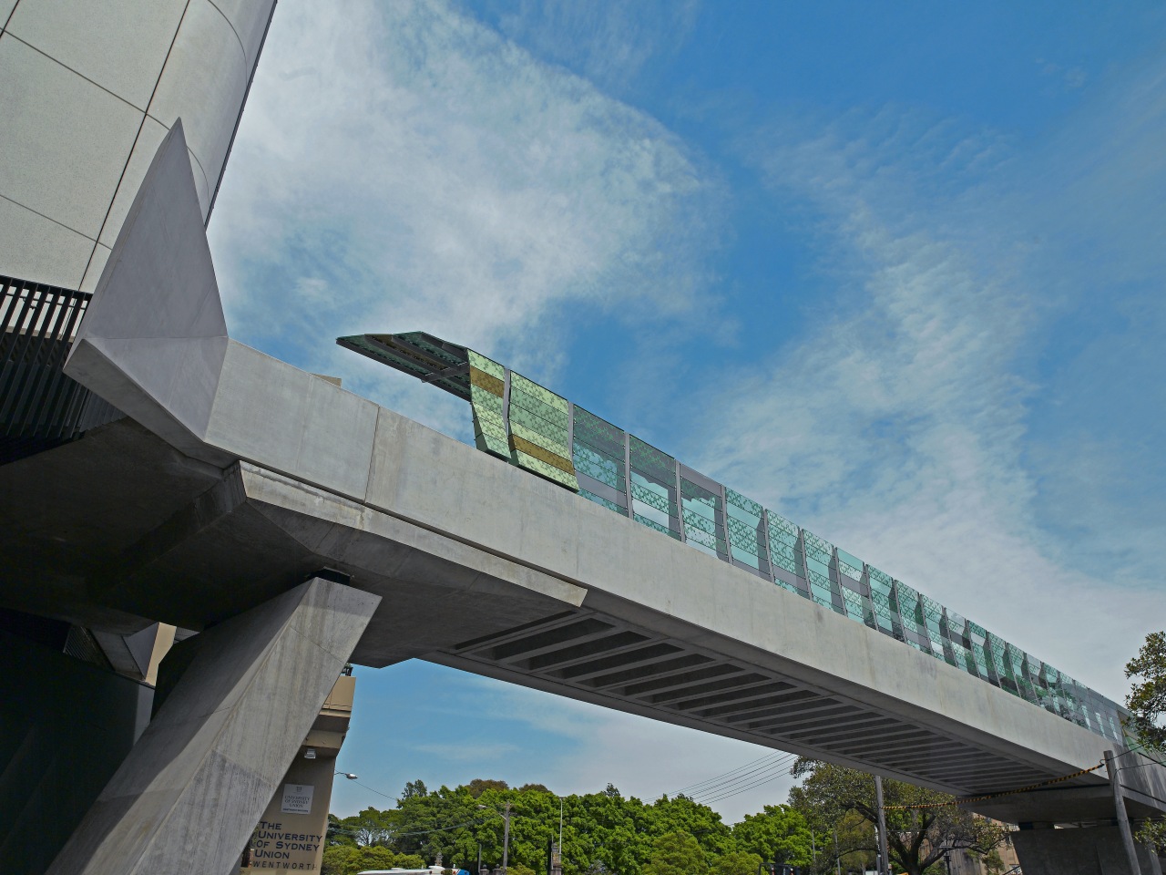 view of the Sydney University's City Road pedestrian architecture, bridge, building, cloud, concrete bridge, daytime, extradosed bridge, fixed link, girder bridge, metropolitan area, overpass, sky, skyway, gray, teal