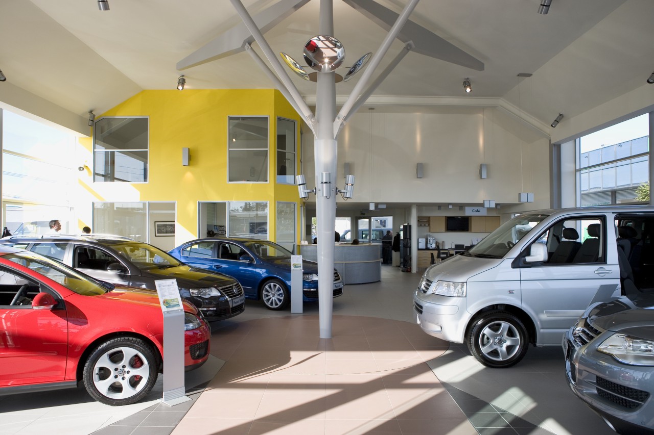 View of Tristram European's new VW showroom which auto show, automobile repair shop, automotive design, building, car, car dealership, city car, motor vehicle, vehicle, gray