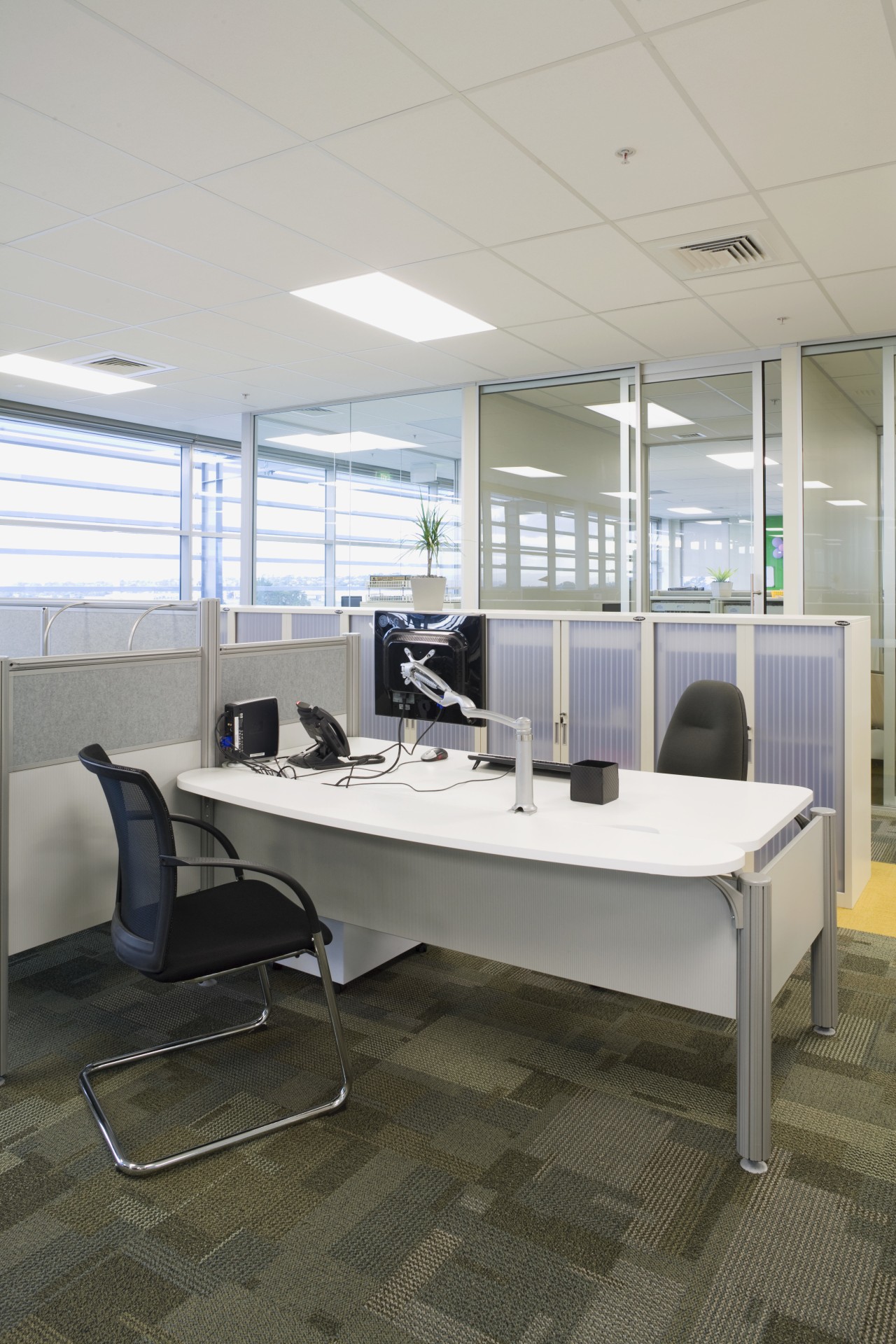 Office Max has recently moved to a new desk, floor, furniture, office, product design, gray