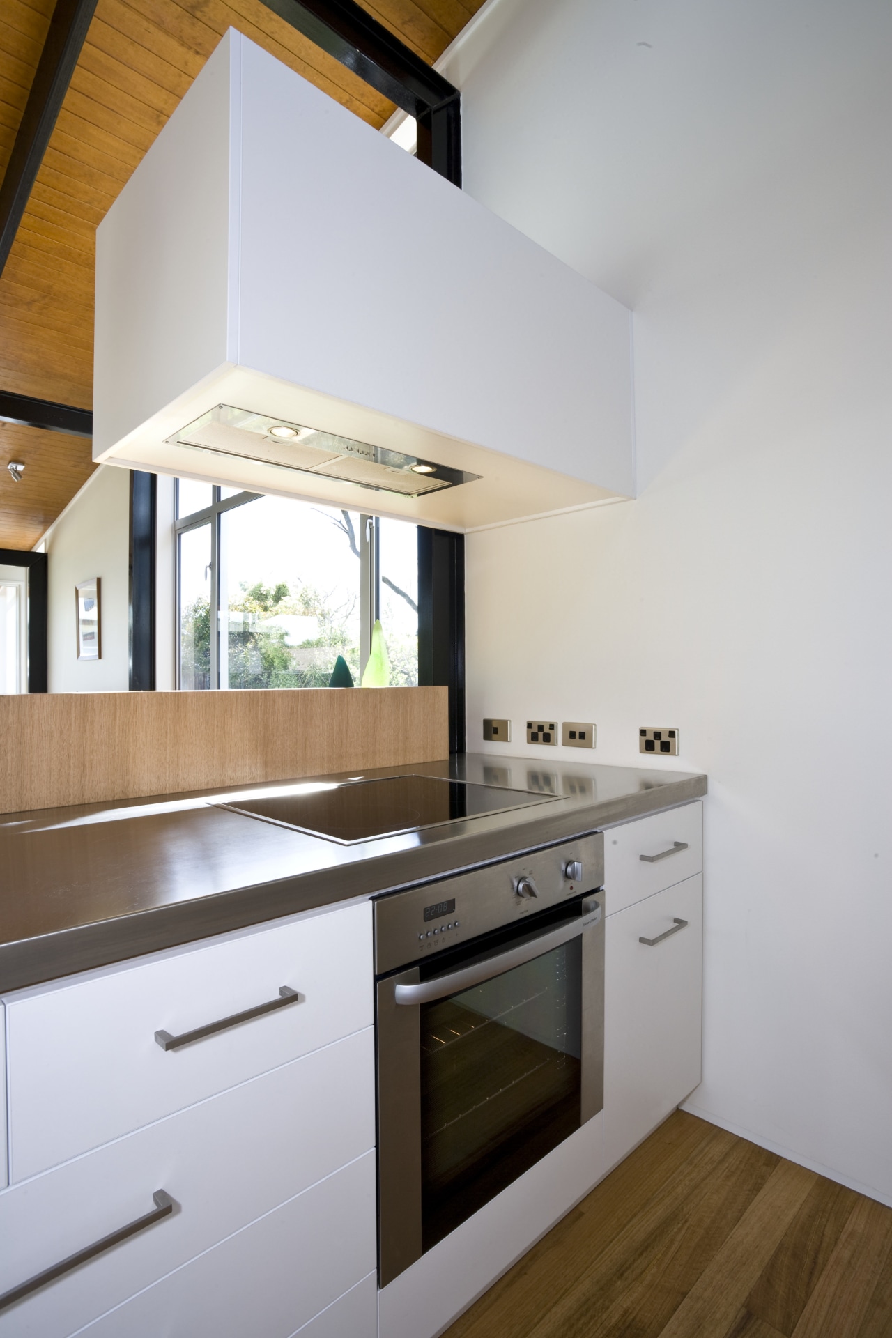 View of a kitchen which features a hood architecture, cabinetry, countertop, cuisine classique, daylighting, home, house, interior design, kitchen, real estate, room, gray