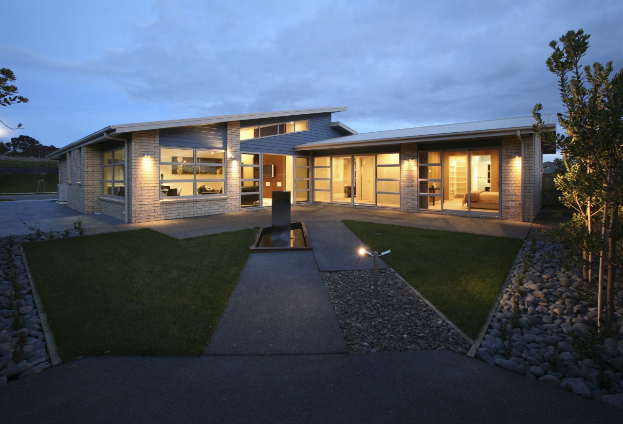 Image of a display home for CBANZ which architecture, estate, facade, home, house, lighting, property, real estate, reflection, residential area, sky, window, black, teal