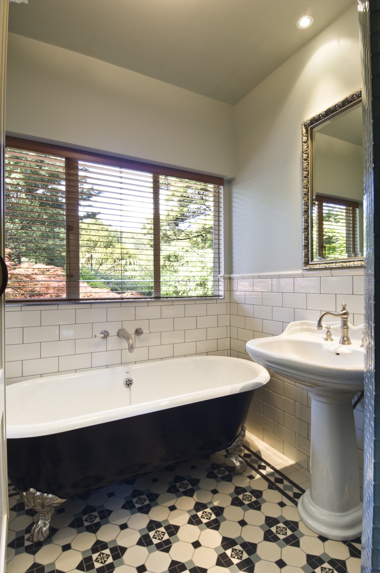 View of a renovated bathroom that features a architecture, bathroom, estate, floor, home, interior design, property, real estate, room, tile, window, brown