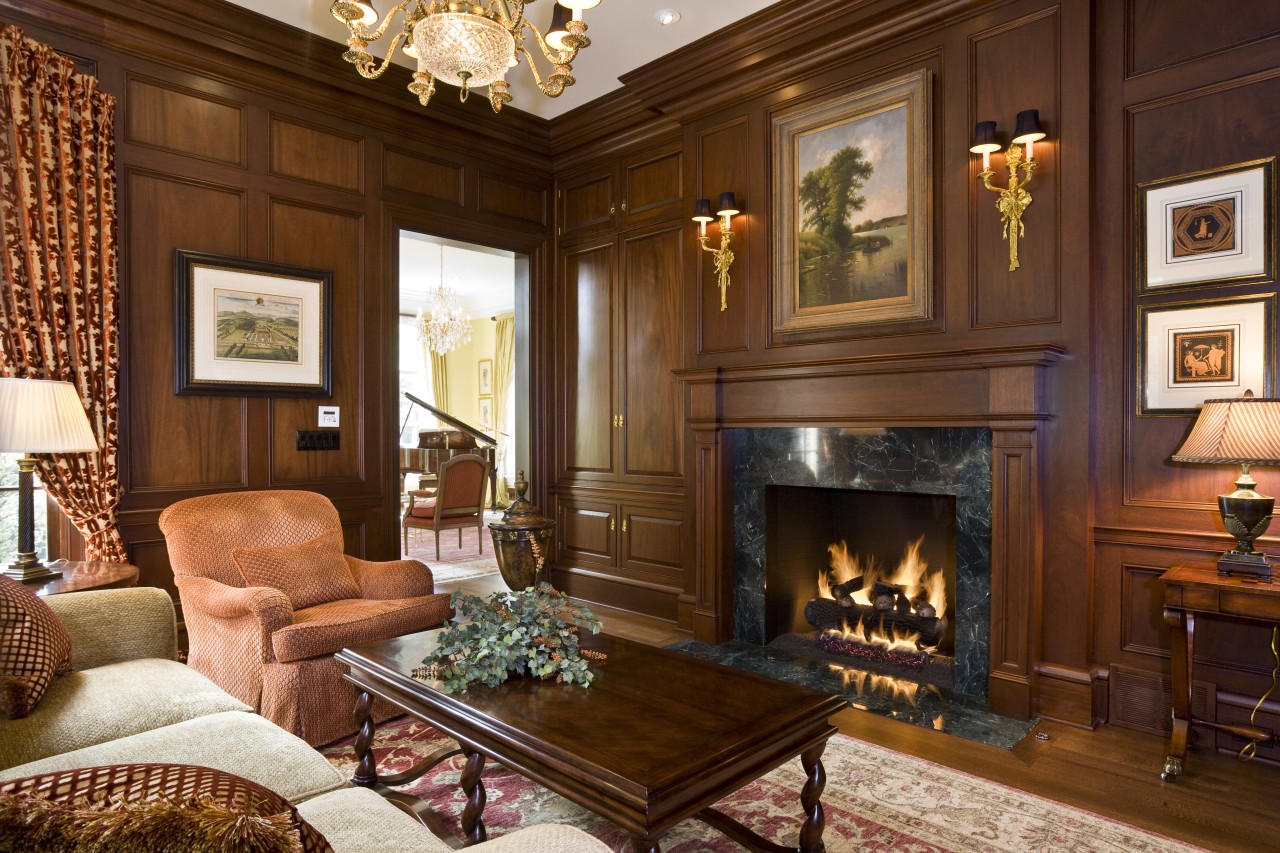 View of the study with dark-stained mahogany paneled estate, fireplace, hearth, home, interior design, living room, room, brown