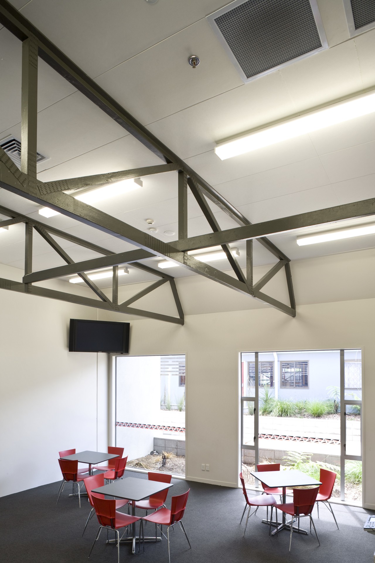 Image of Te Whanau o Tupuranga school which architecture, ceiling, daylighting, interior design, product design, gray